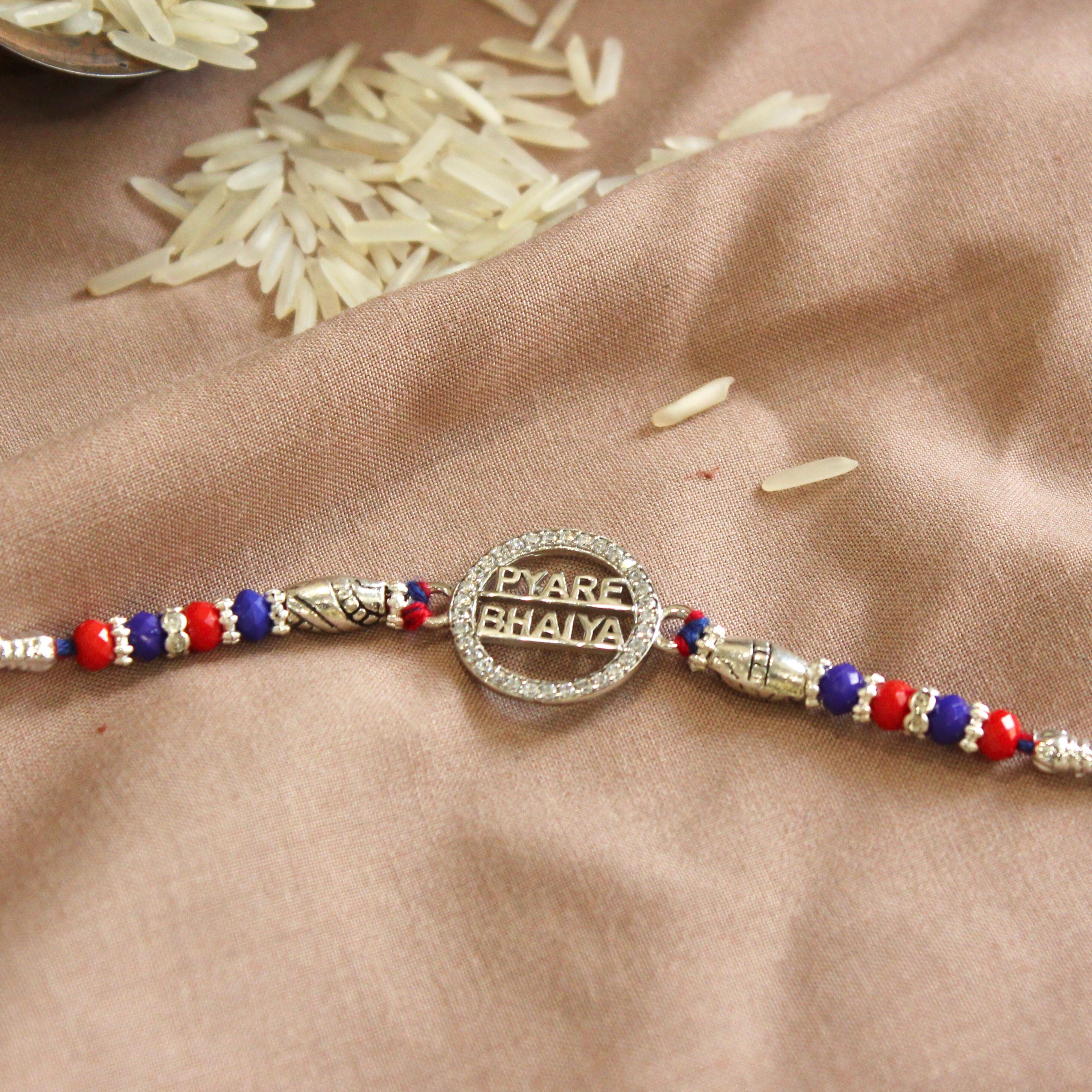 'PYARA BHAIYA' red thread rakhi in 925 silver