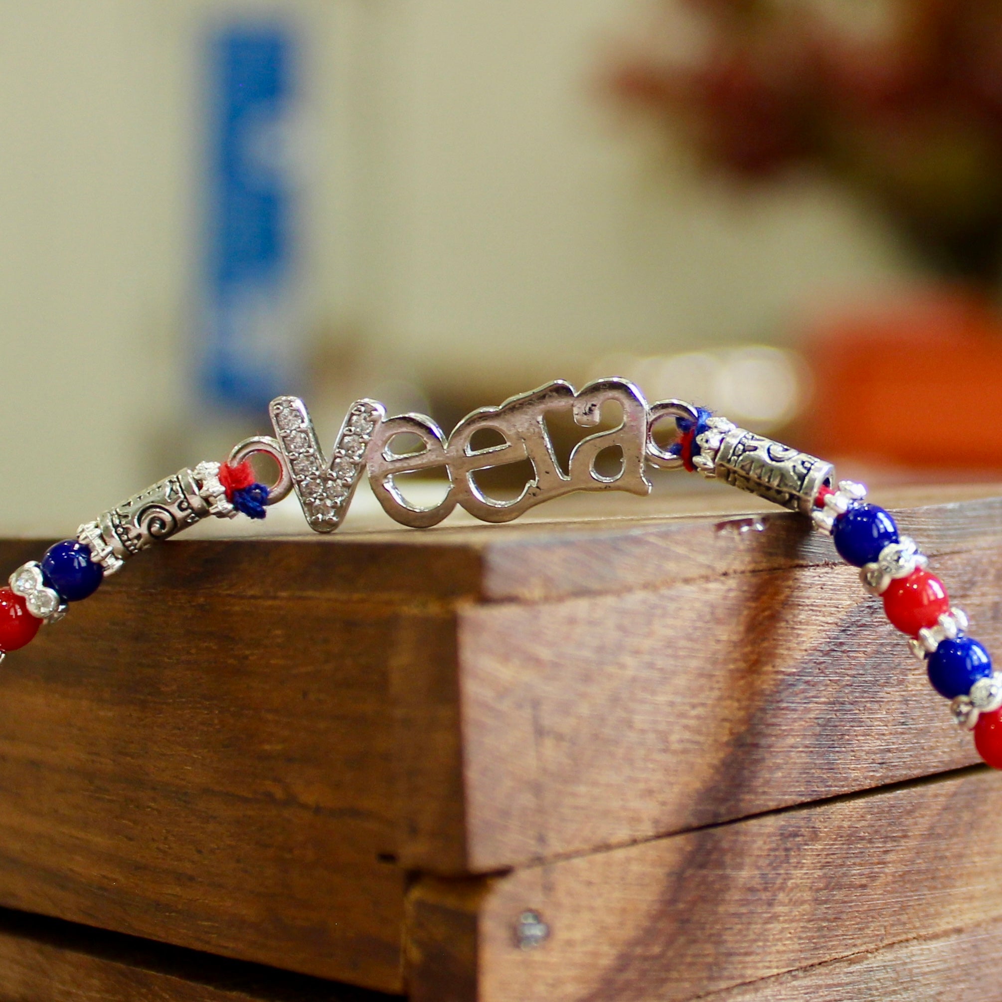 'VEERA' Red Thread Rakhi in 925 silver