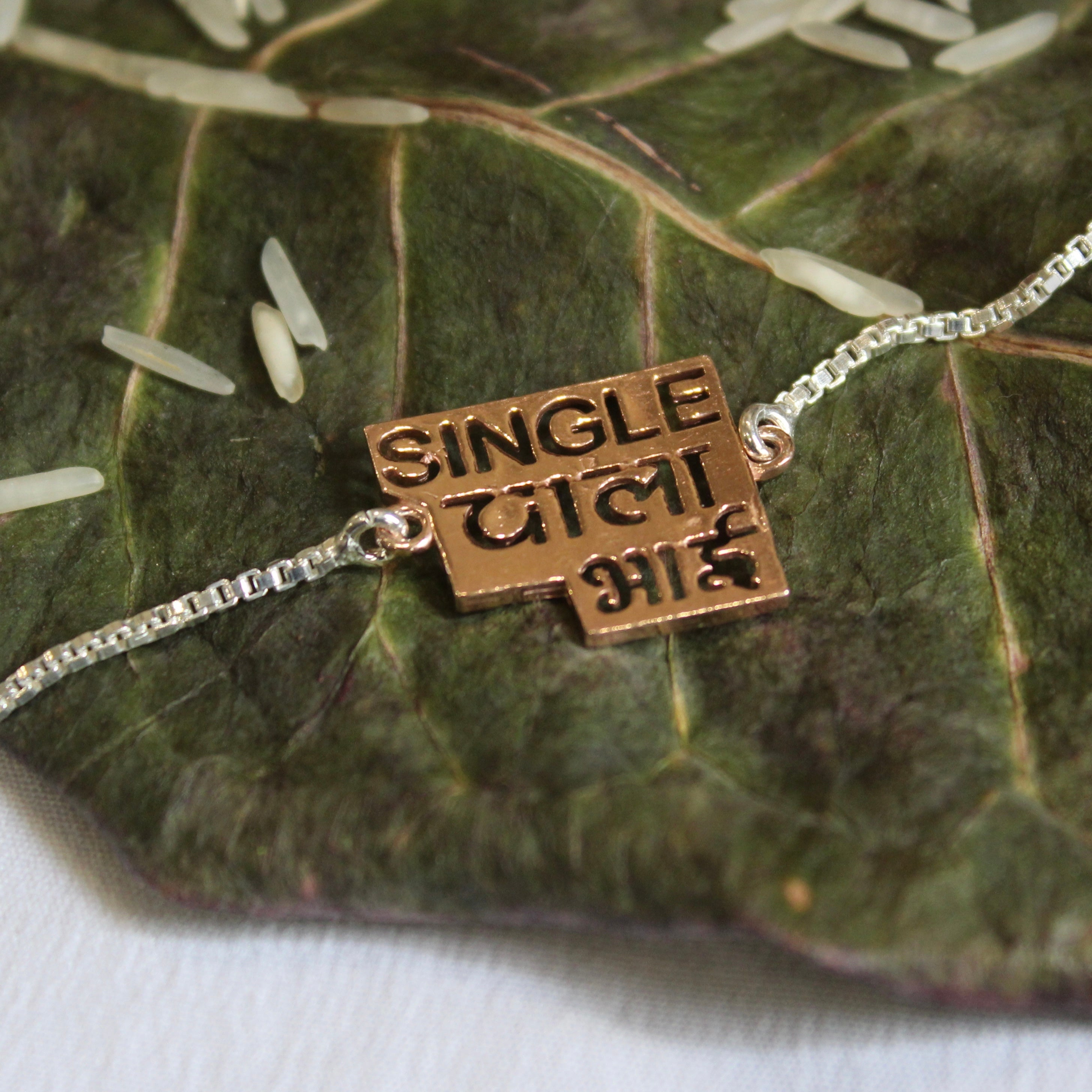 'SINGLE WALA BHAI' 925 Silver Chained Rakhi in rose gold polish