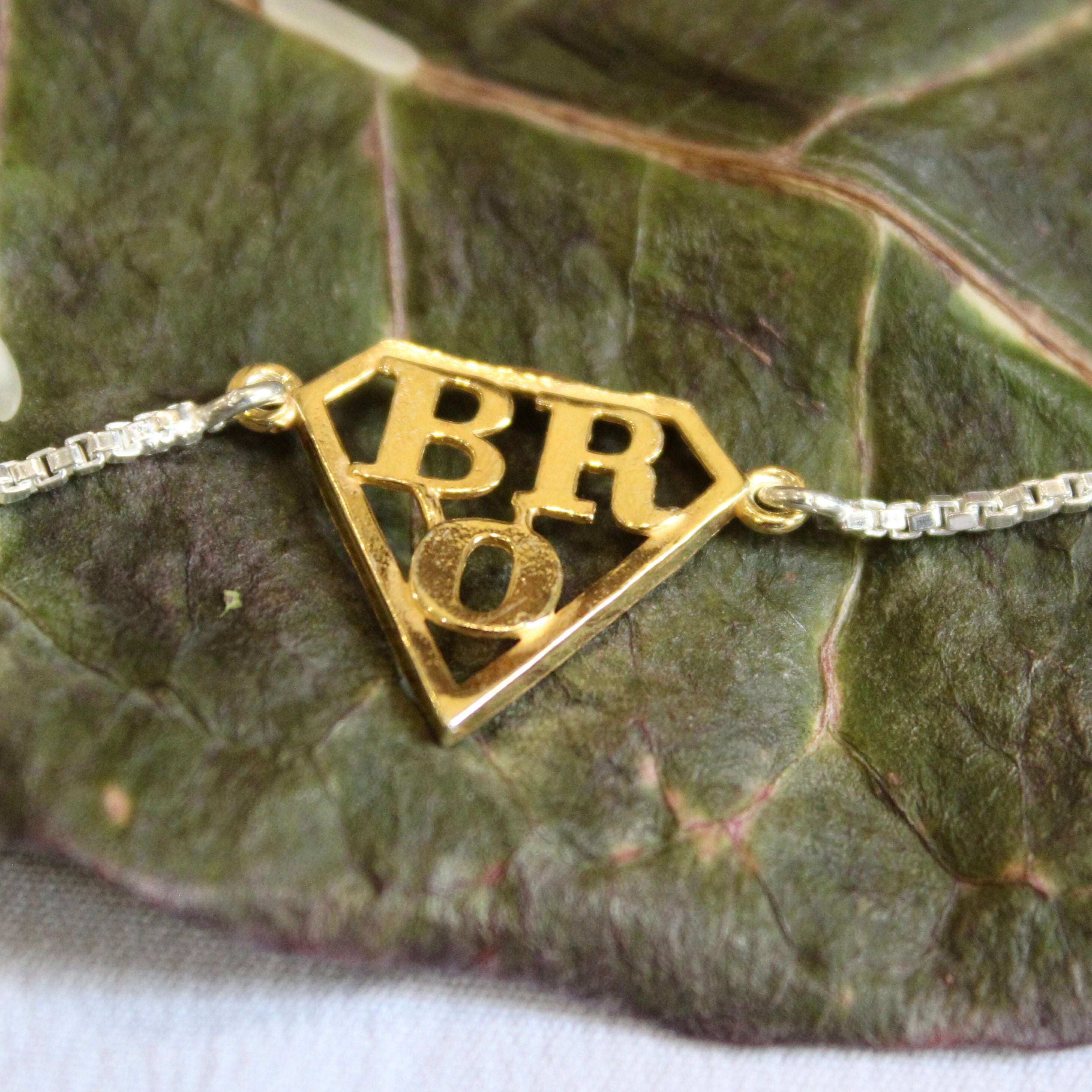 'SUPERMAN BRO' 925 Pure Silver Chained Rakhi in Gold Polish