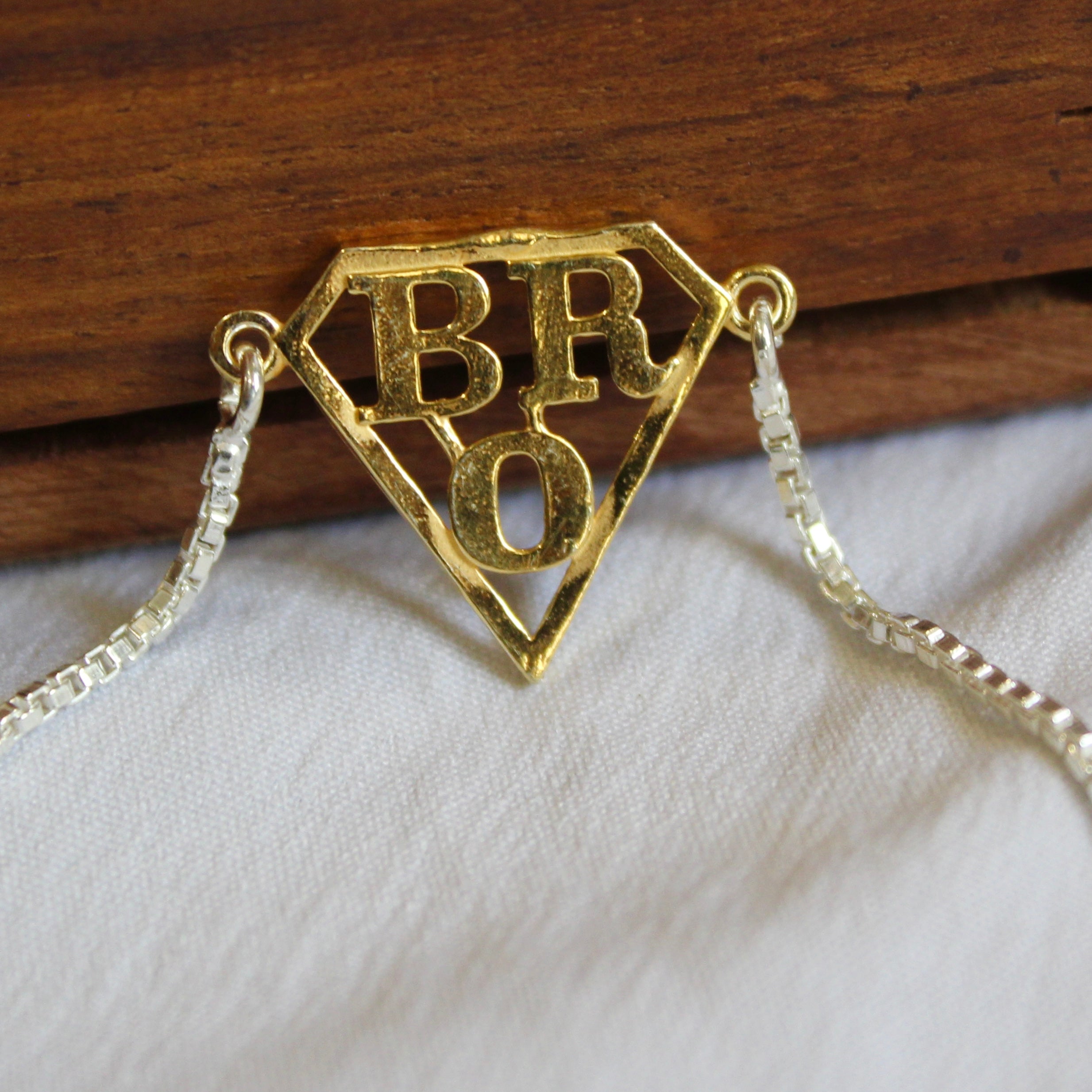 'SUPERMAN BRO' 925 Pure Silver Chained Rakhi in Gold Polish