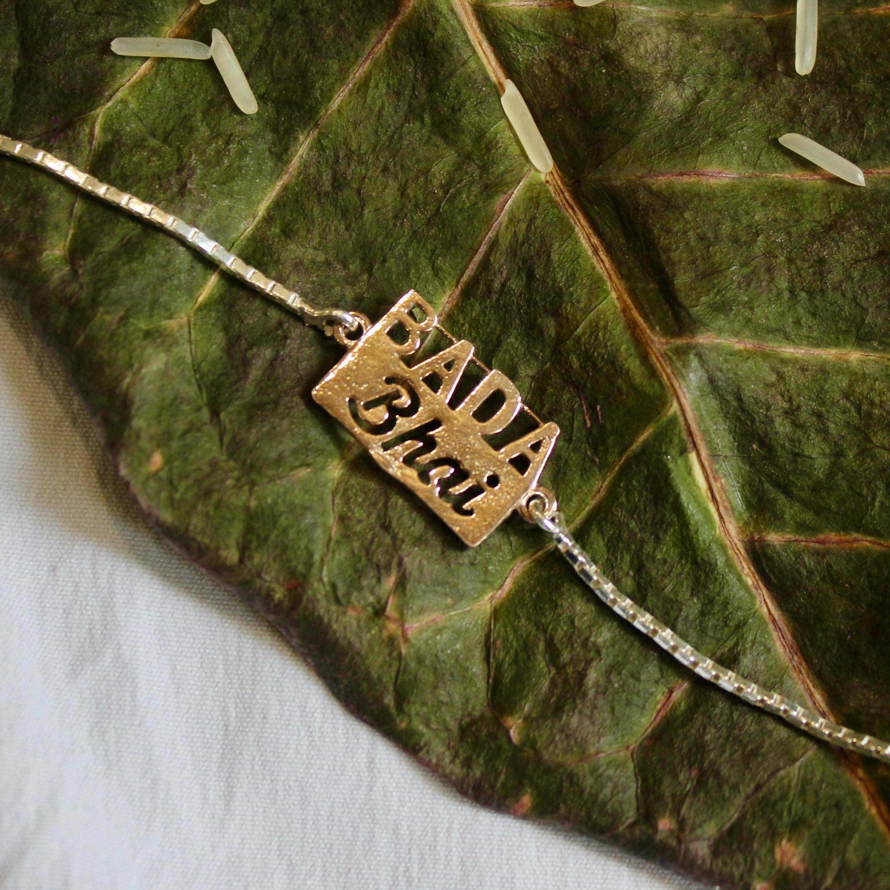 'Bada Bhai' Pure Silver Chained Rakhi in rose gold polish