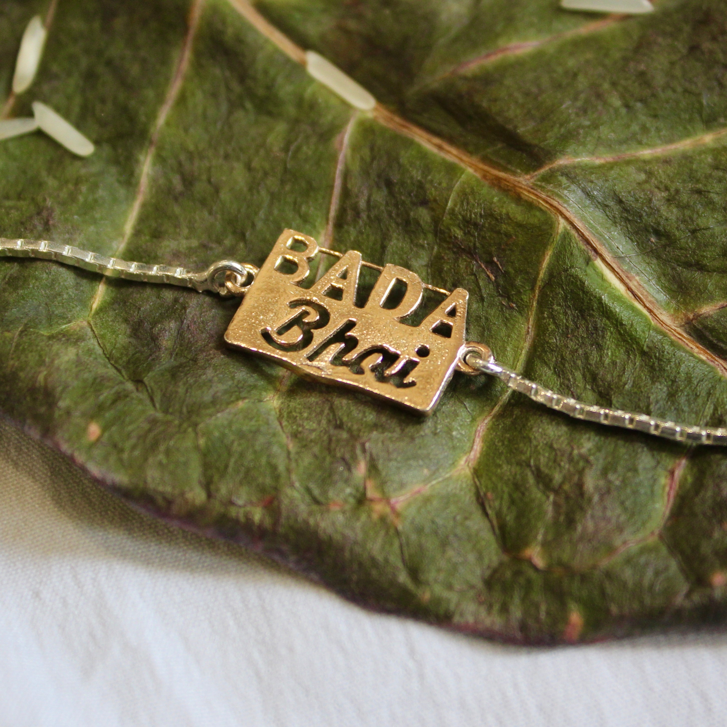 'Bada Bhai' Pure Silver Chained Rakhi in rose gold polish