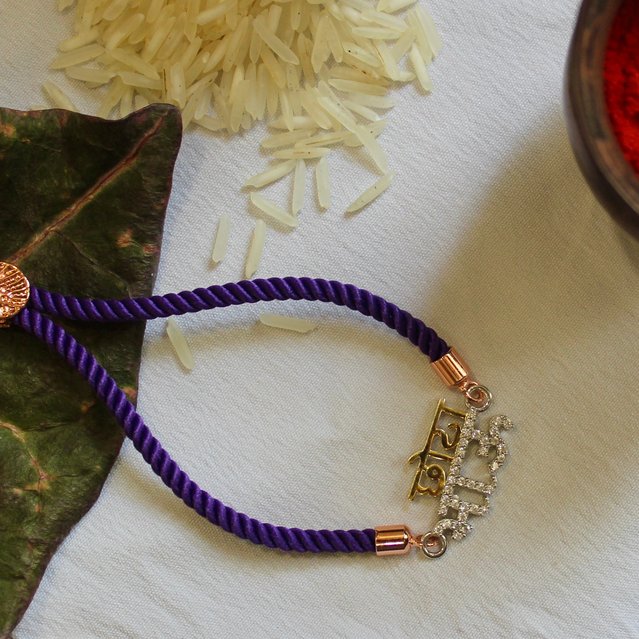 'CHHOTA BHAU' Purple Thread Rakhi in 925 Silver