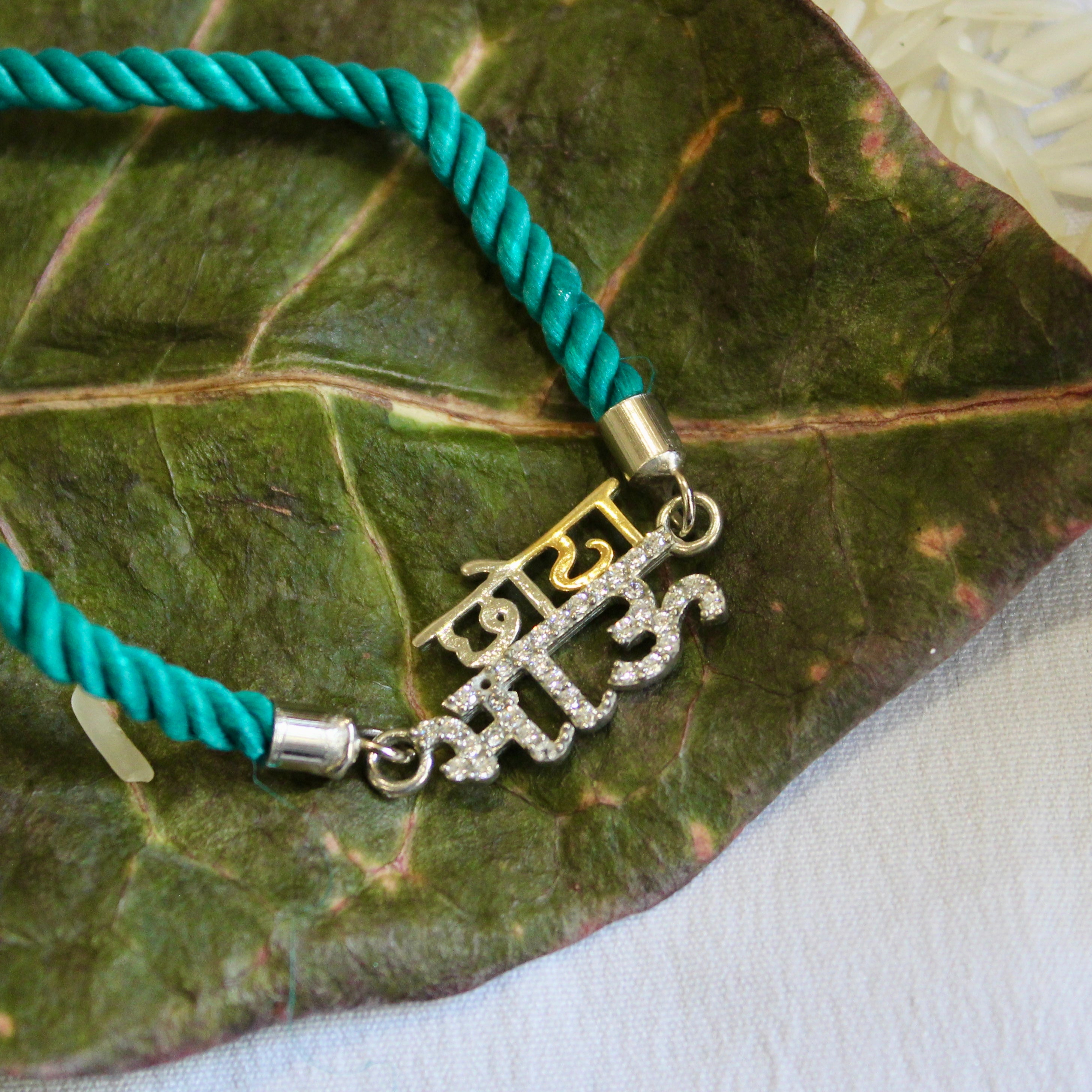 'CHHOTA BHAU' Green Thread Rakhi in 925 Silver