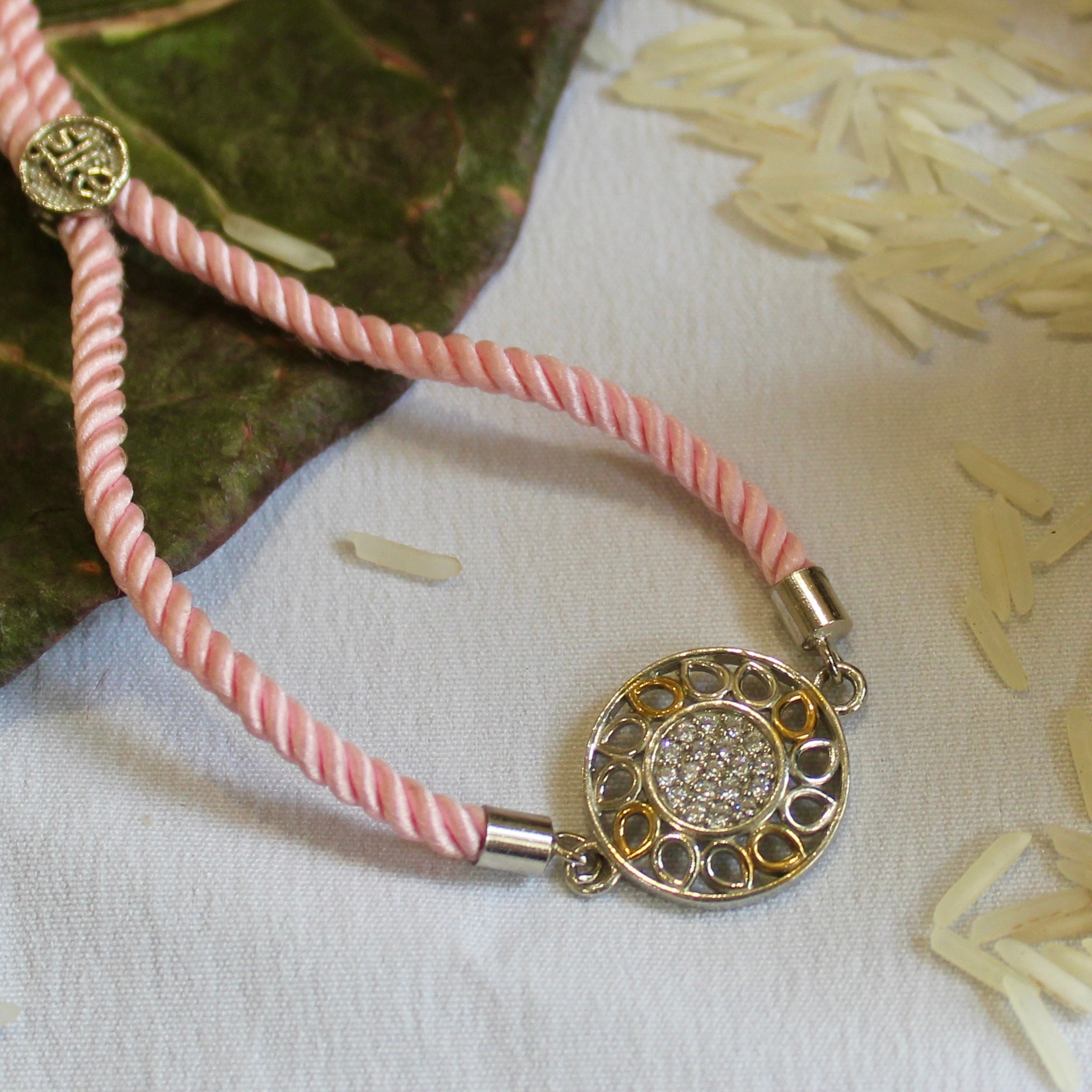 'Flower' Pink Thread Rakhi in 925 Silver