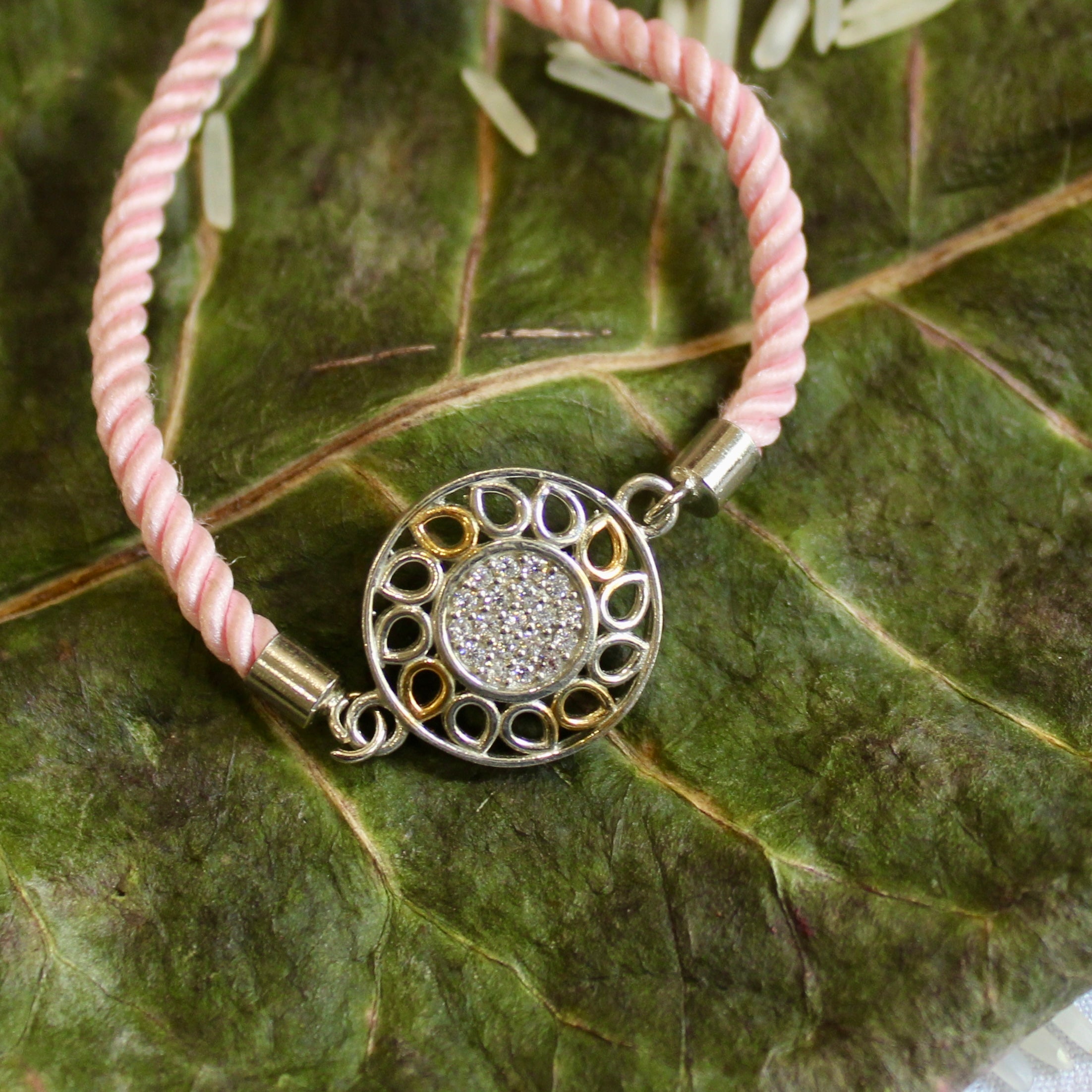 'Flower' Pink Thread Rakhi in 925 Silver