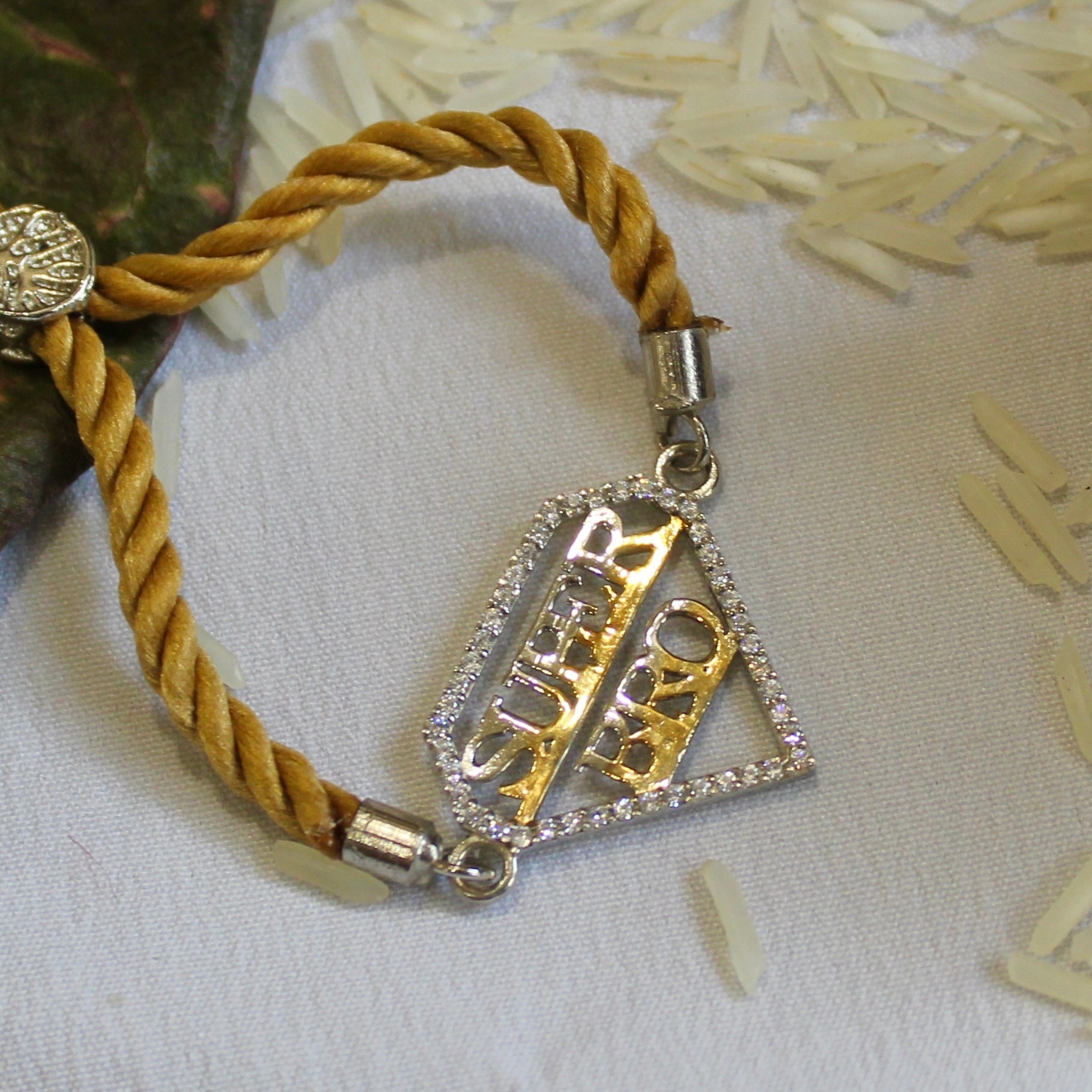 'SUPER BRO' Golden Thread Rakhi in 925 Silver