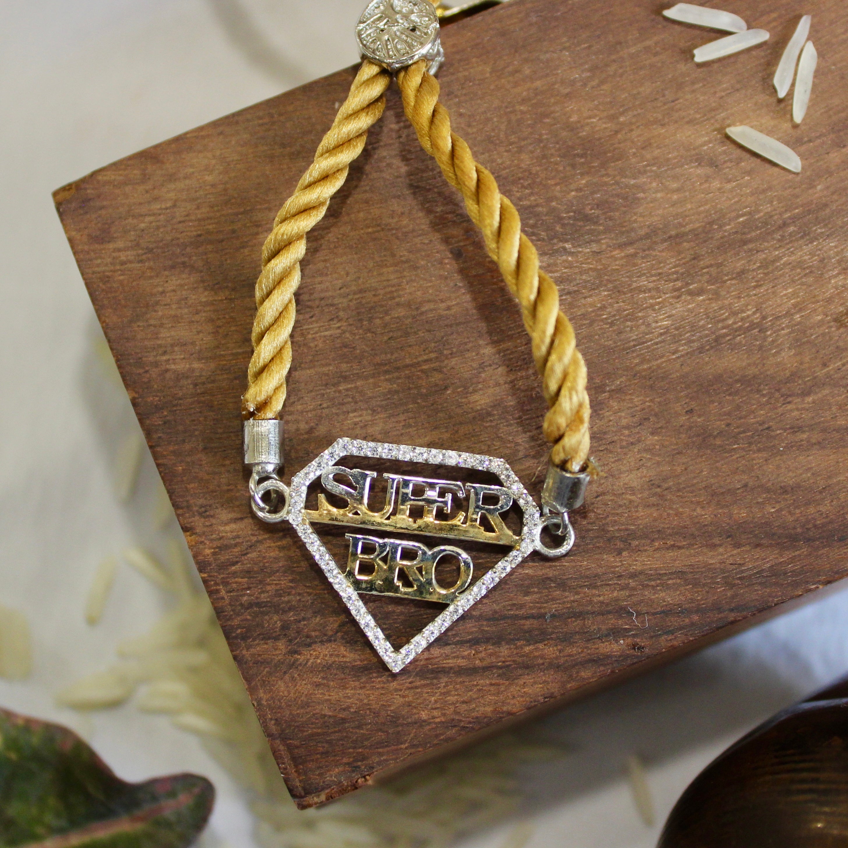 'SUPER BRO' Golden Thread Rakhi in 925 Silver