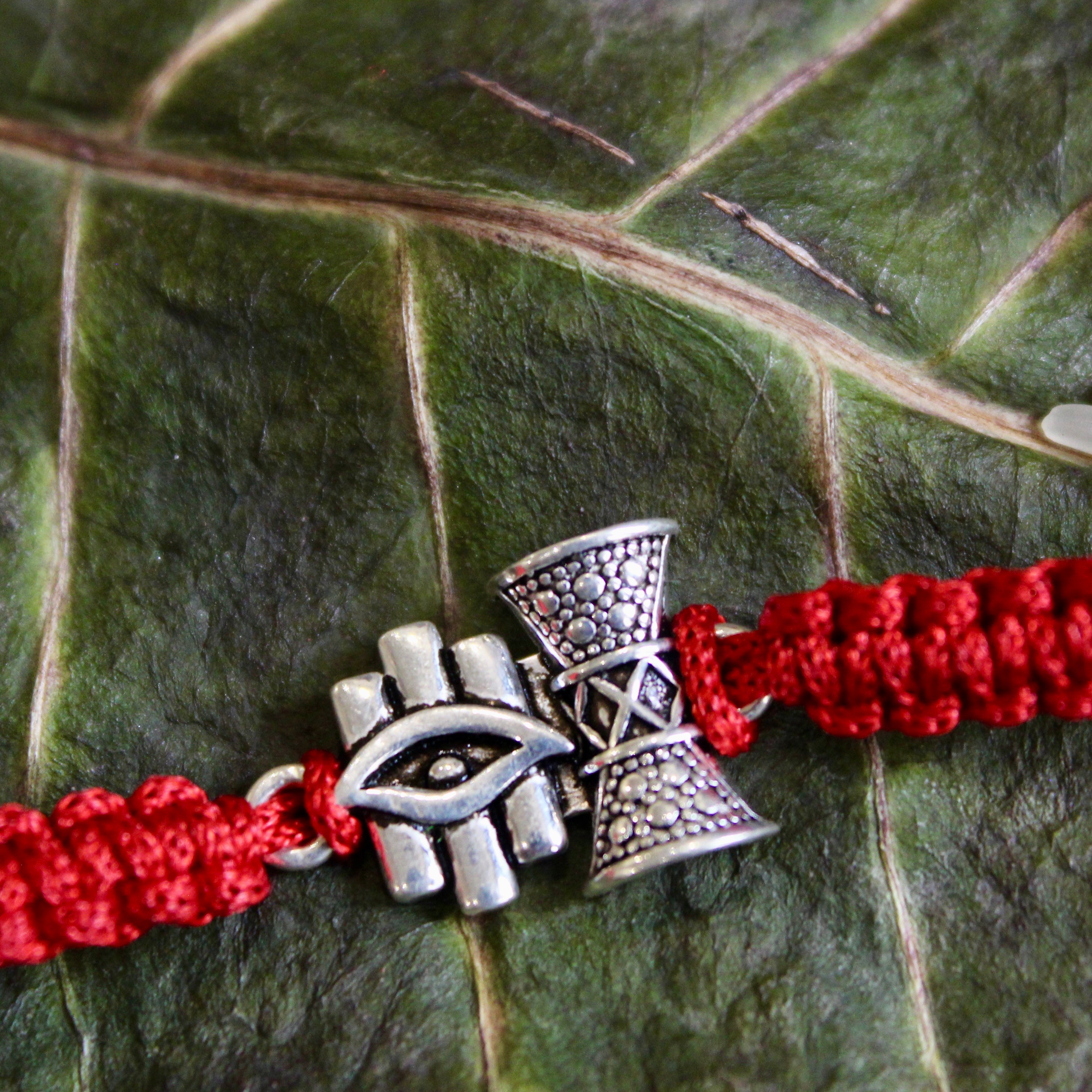 'SHIV DAMRU & EYE' Red Thread Rakhi in 925 Silver