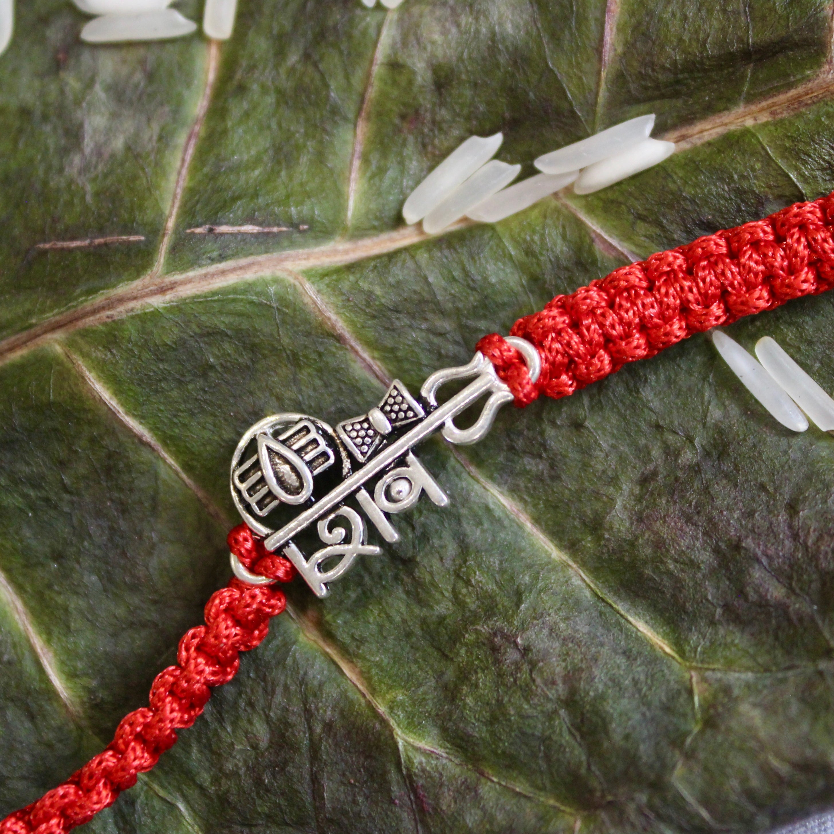 'SHIV' Red thread rakhi in 925 Silver