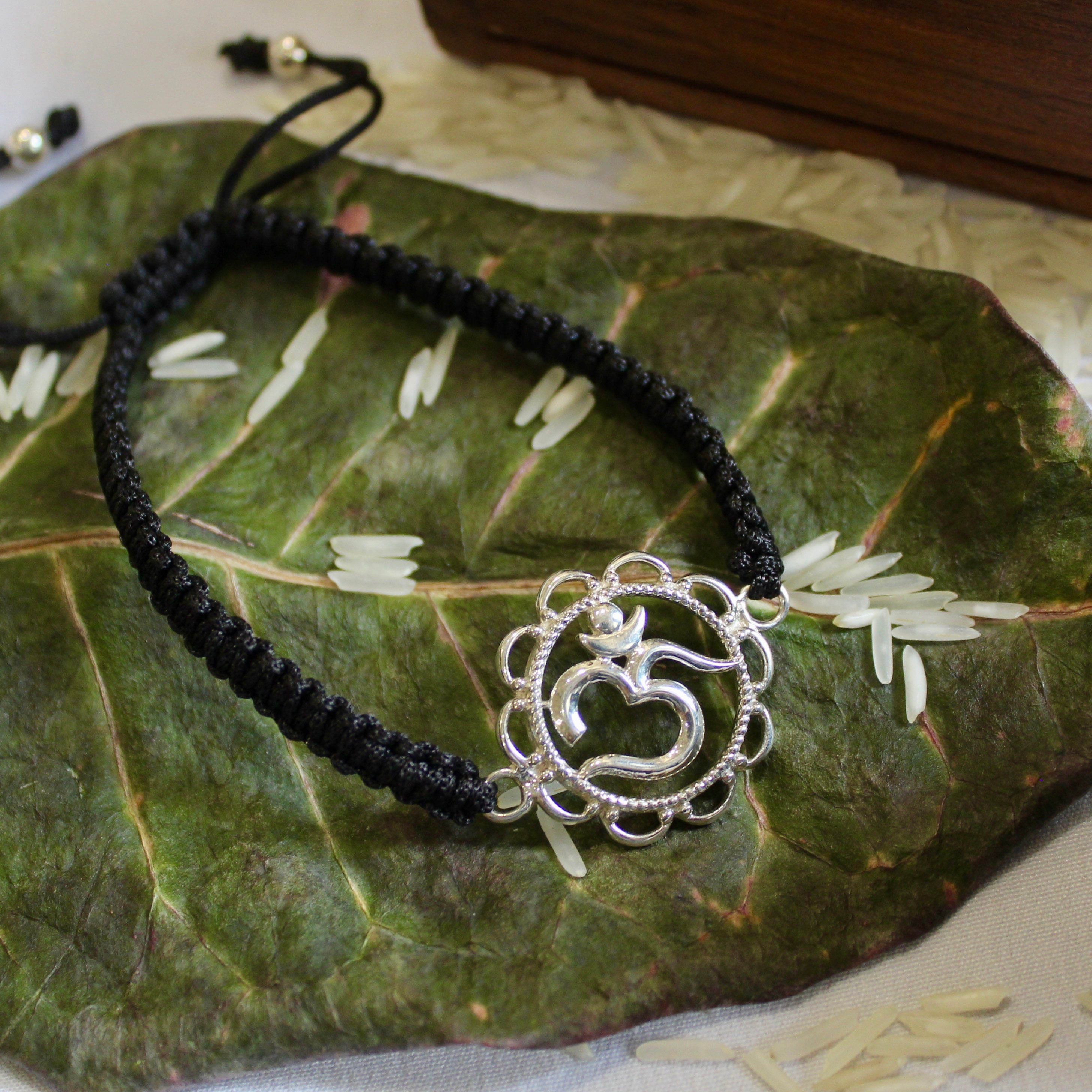 'OM' Black Thread Rakhi in 925 Silver
