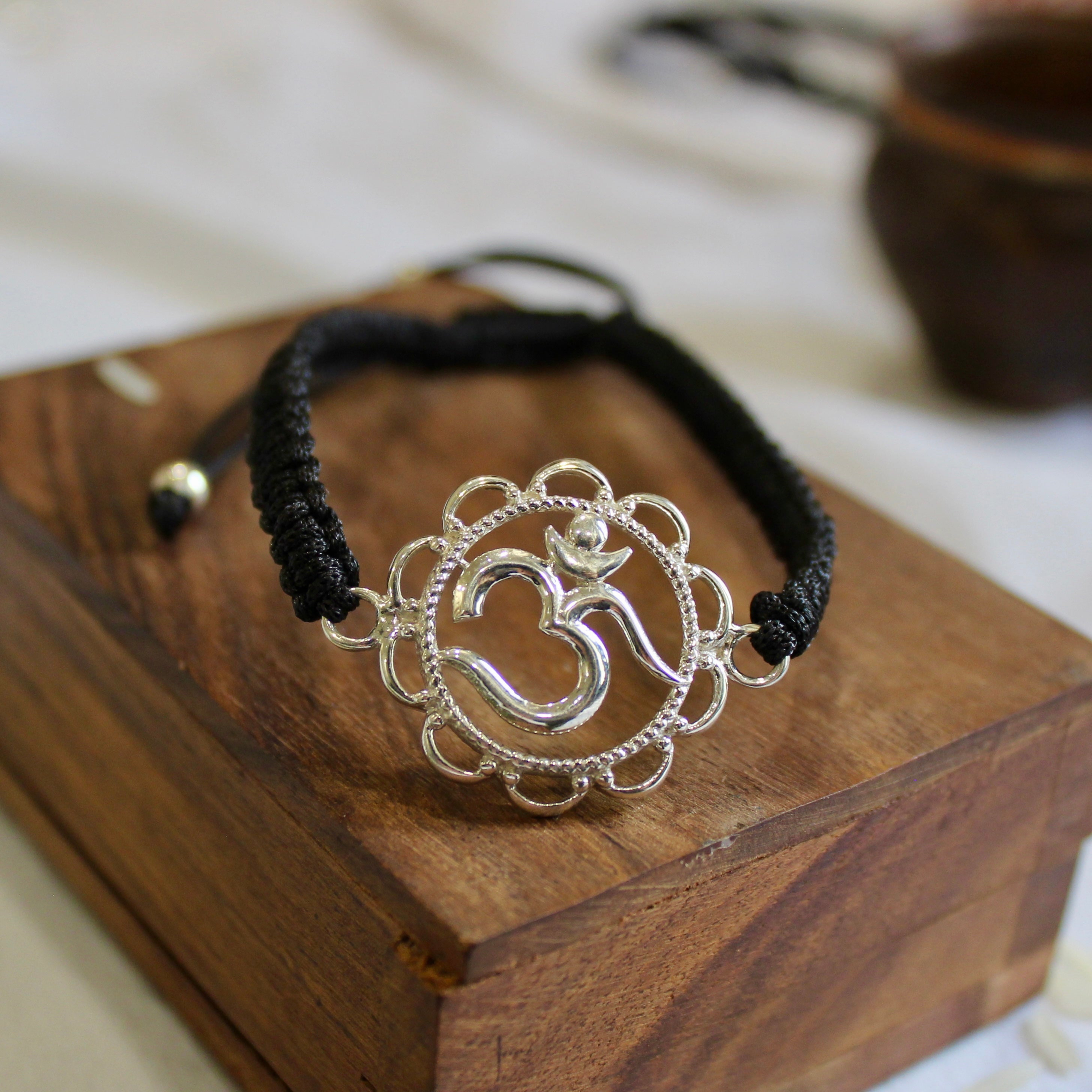 'OM' Black Thread Rakhi in 925 Silver
