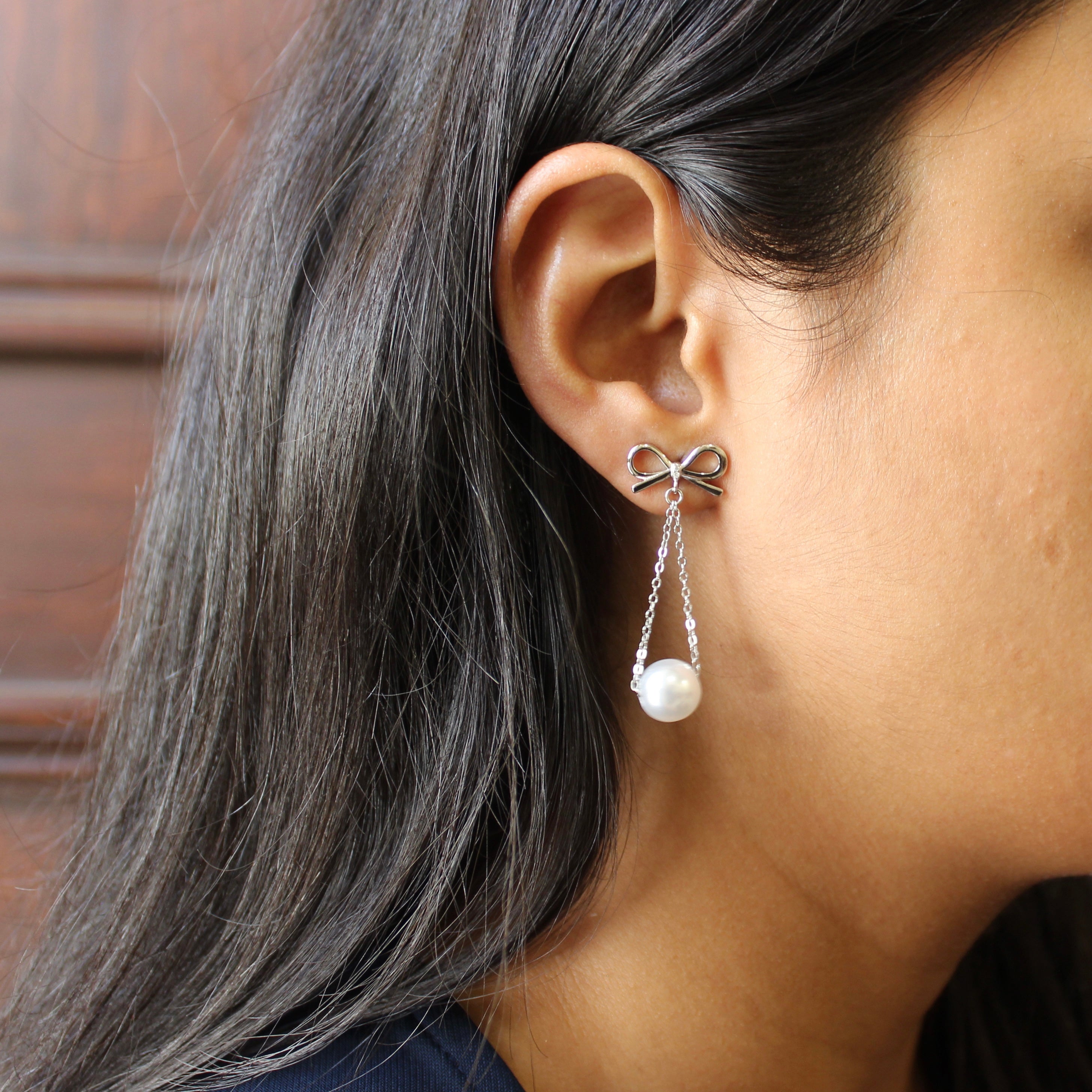 Bow with Hanging Pearl Drop Earrings in 925 Silver