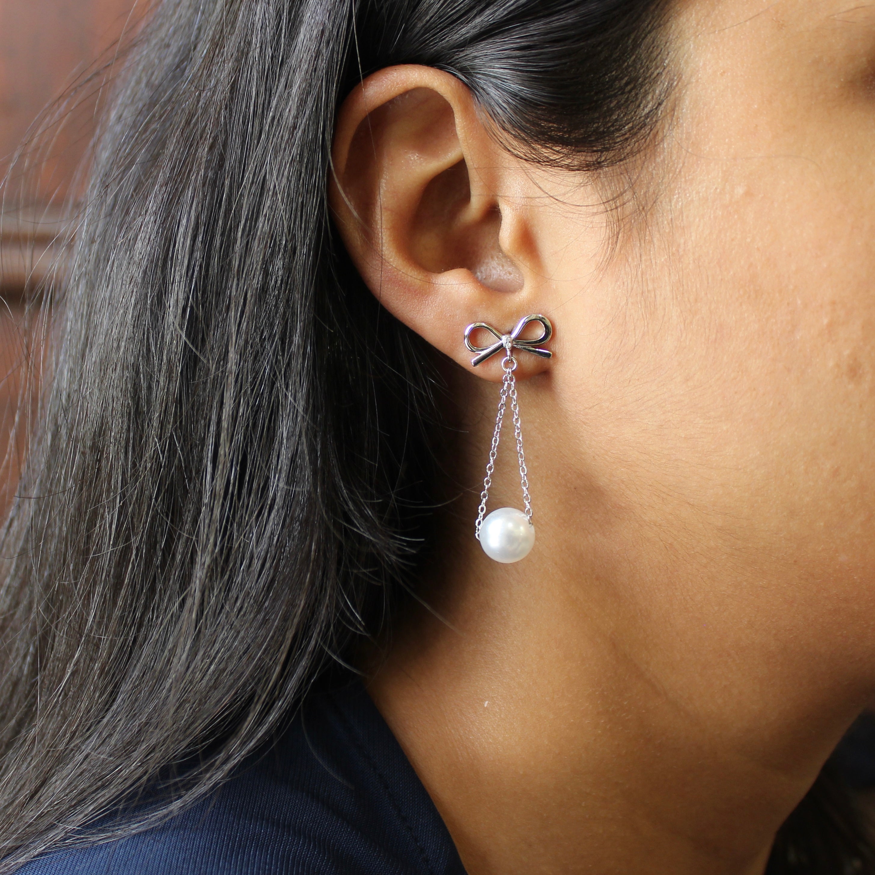 Bow with Hanging Pearl Drop Earrings in 925 Silver