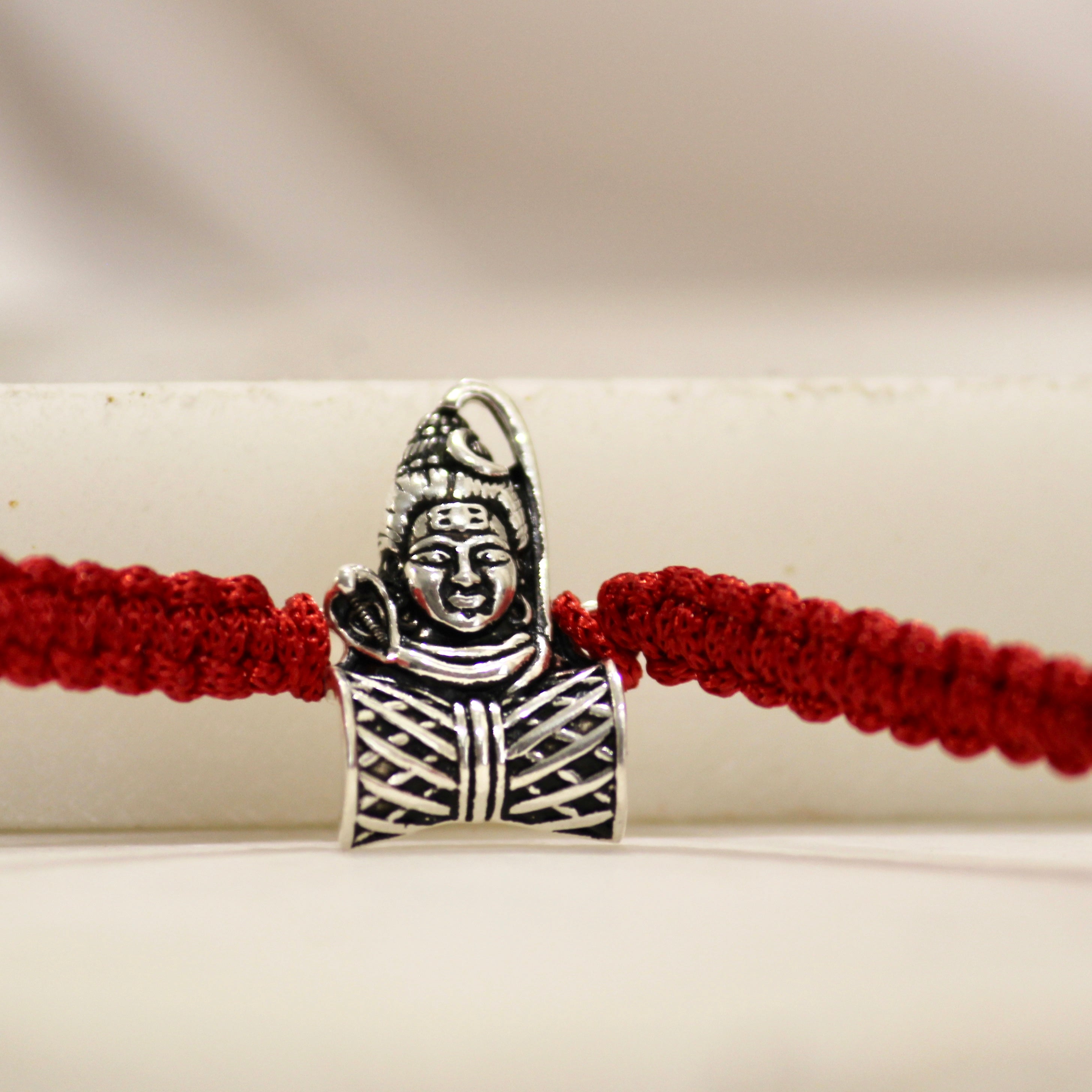 MAHADEV WITH DAMRU 925 silver red thread rakhi