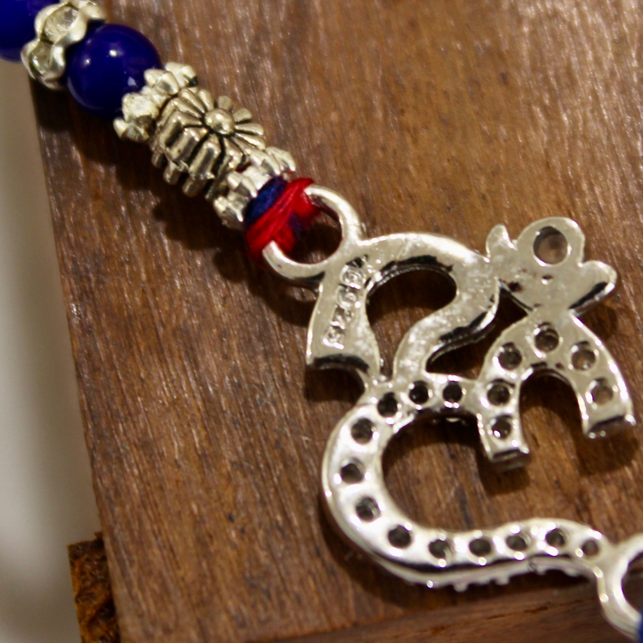 OM CLASSIC 925 silver red thread rakhi