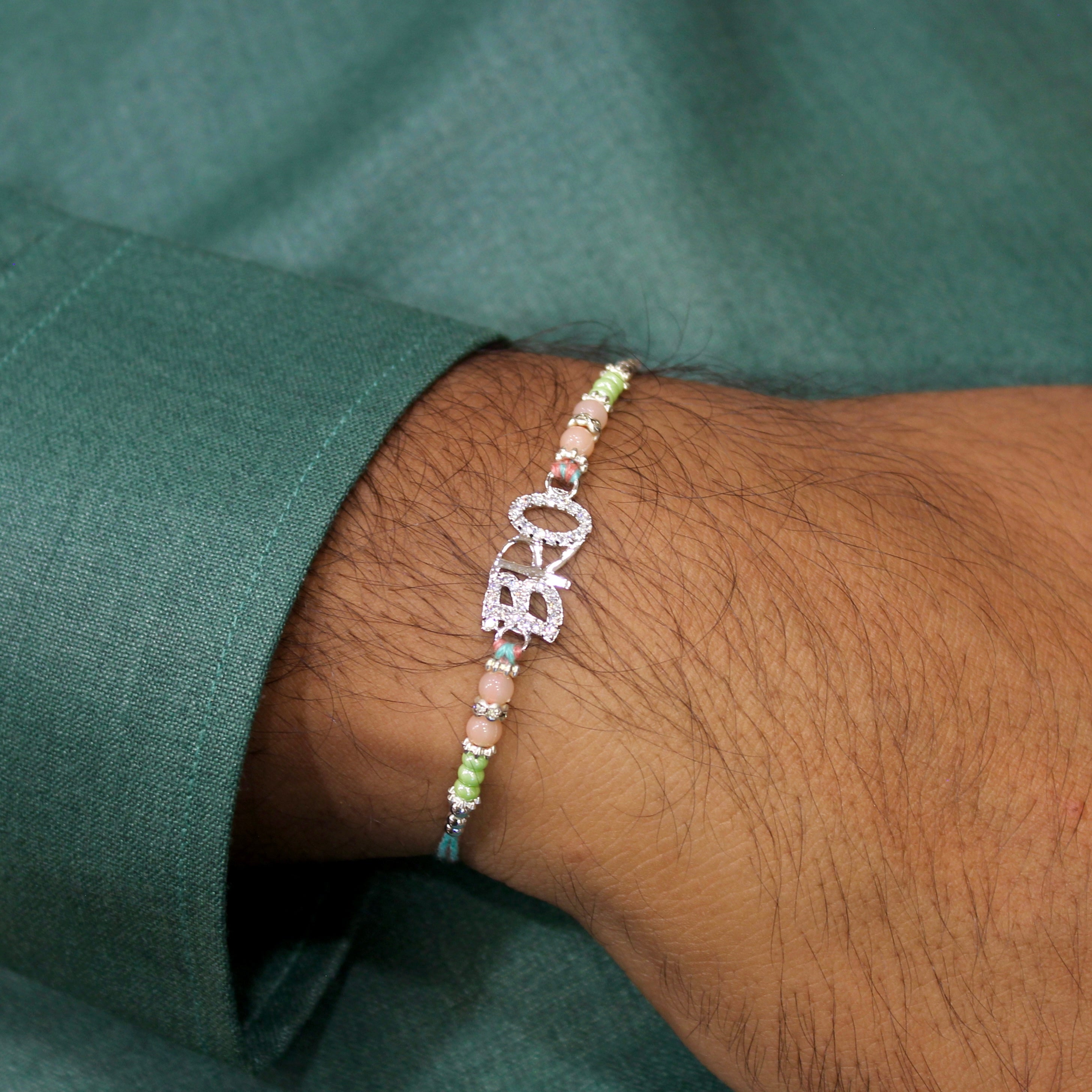 BRO 925 silver peach thread rakhi