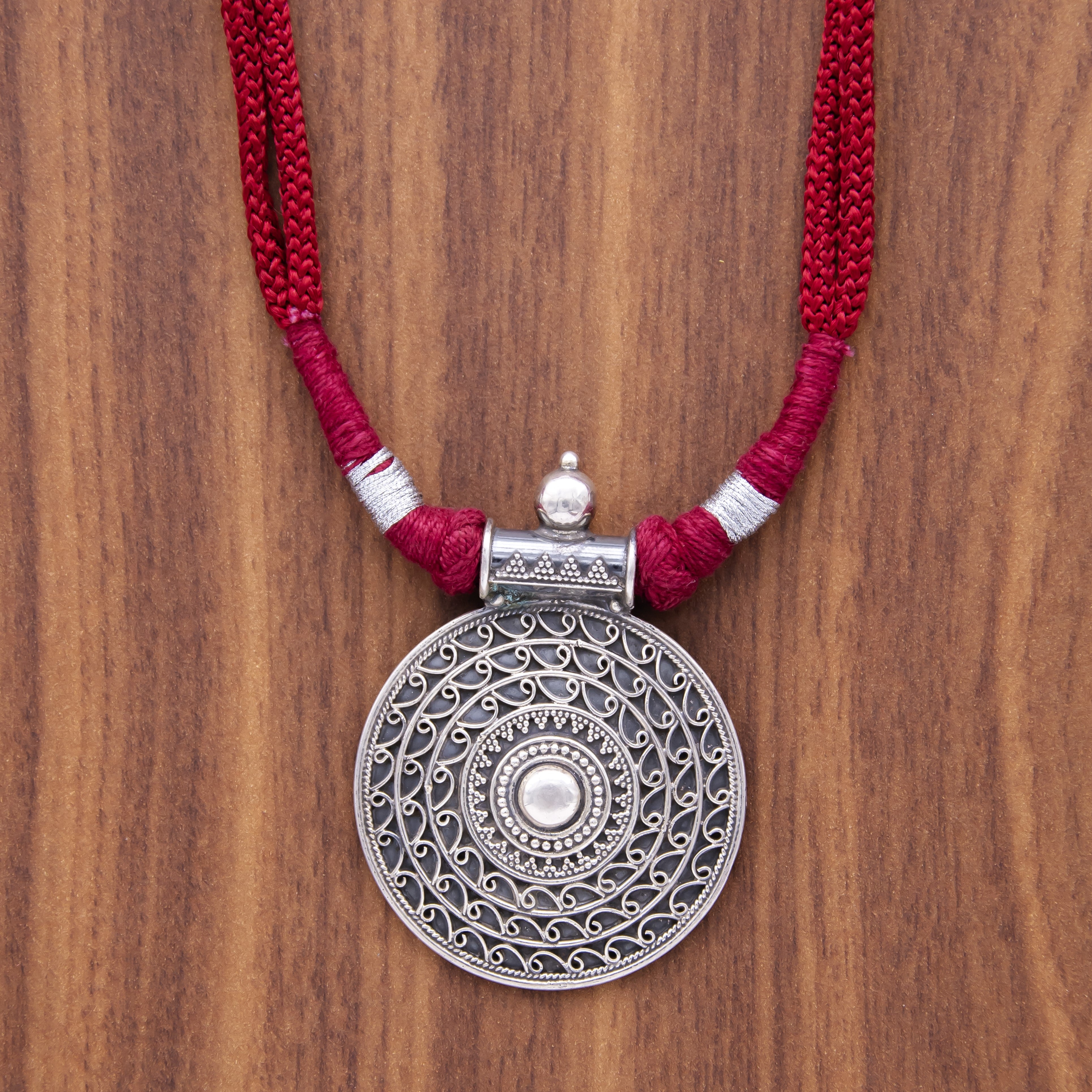 Oxidised circle pattered 925 silver with red dori necklace