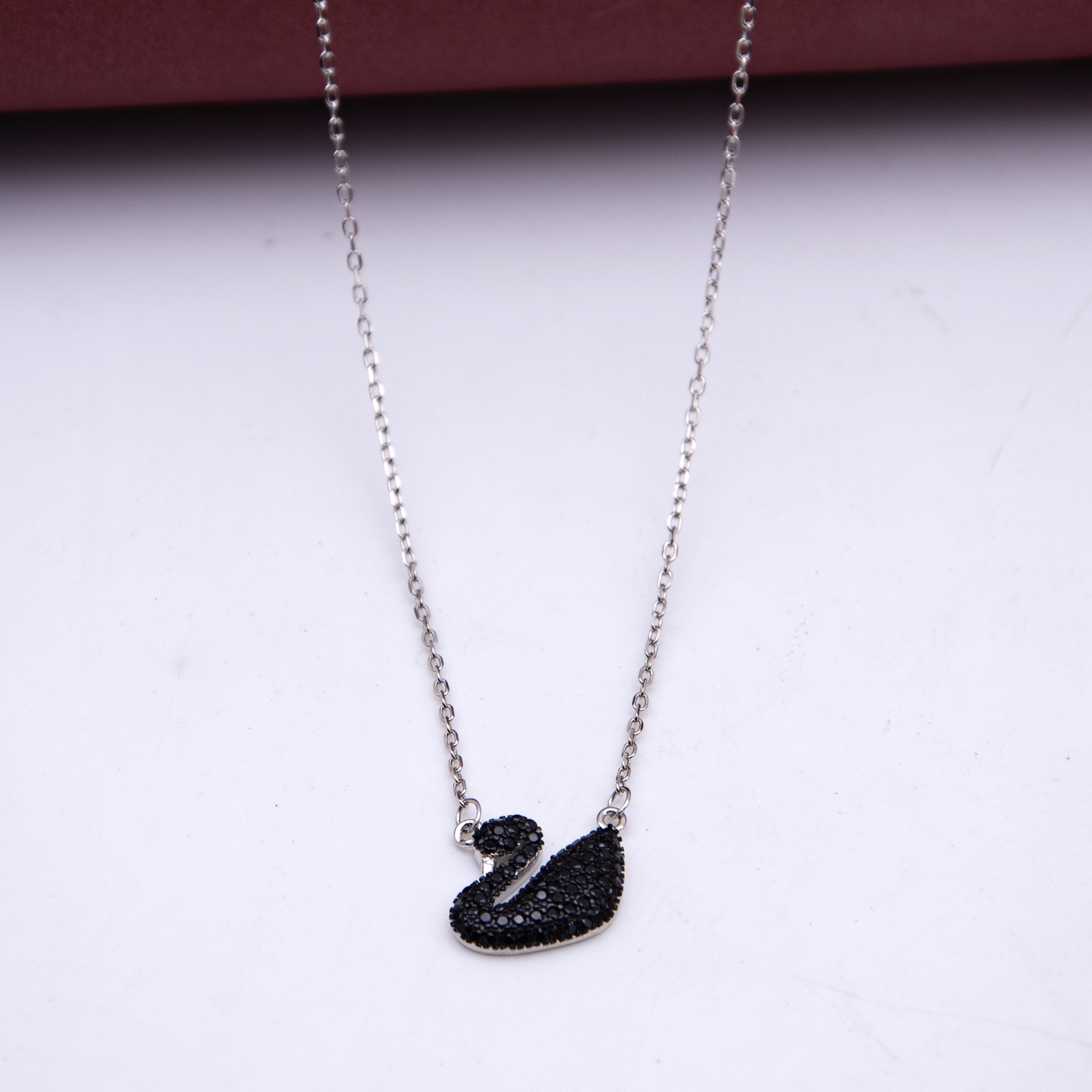 Black swan pendant with 925 silver minimal chain