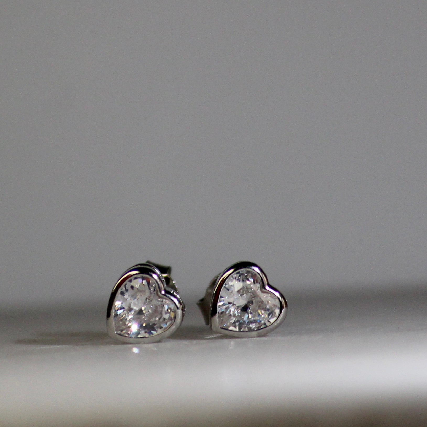 Heart M size single stone 925 silver studs- bordered