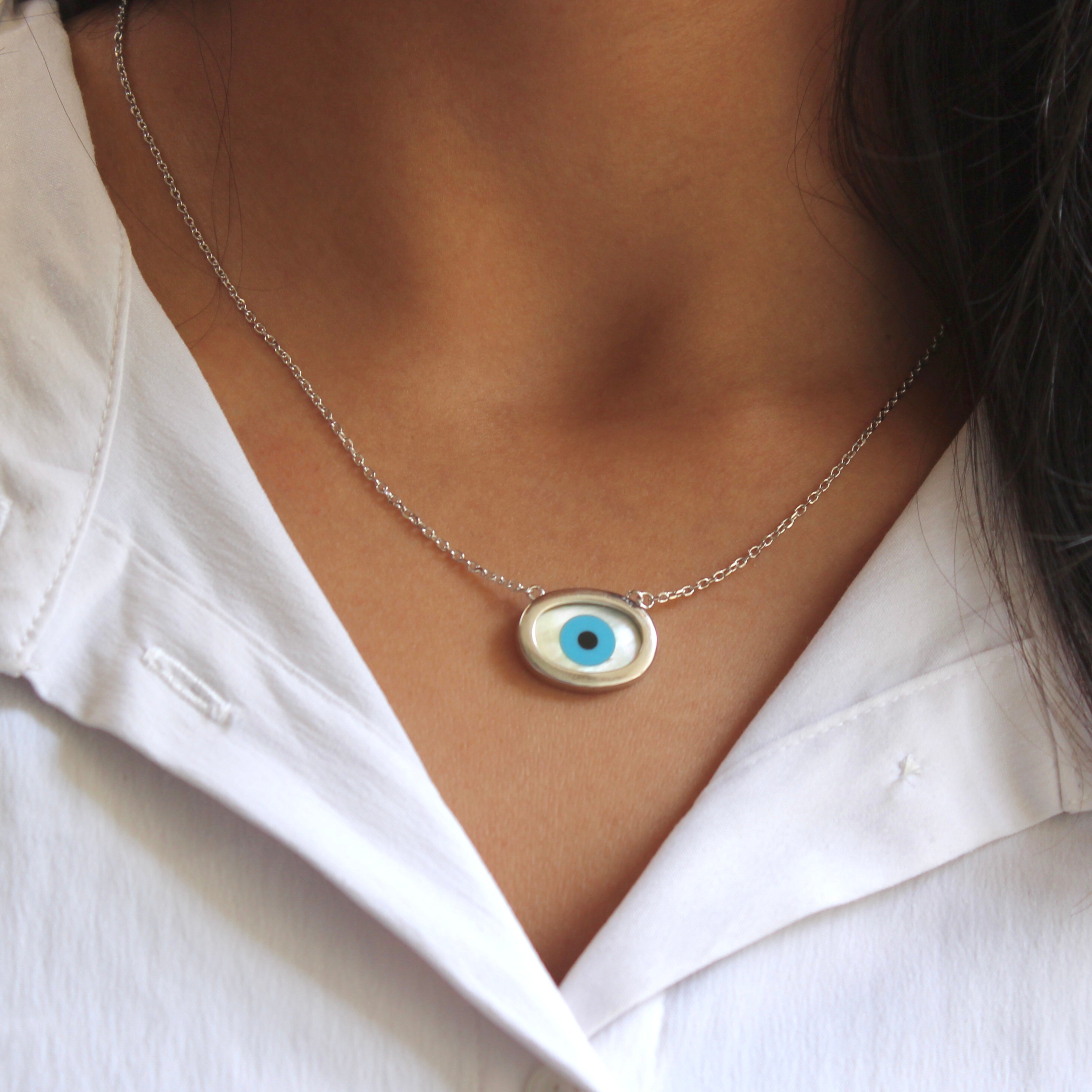 Evil eye oval silver pendant with chain