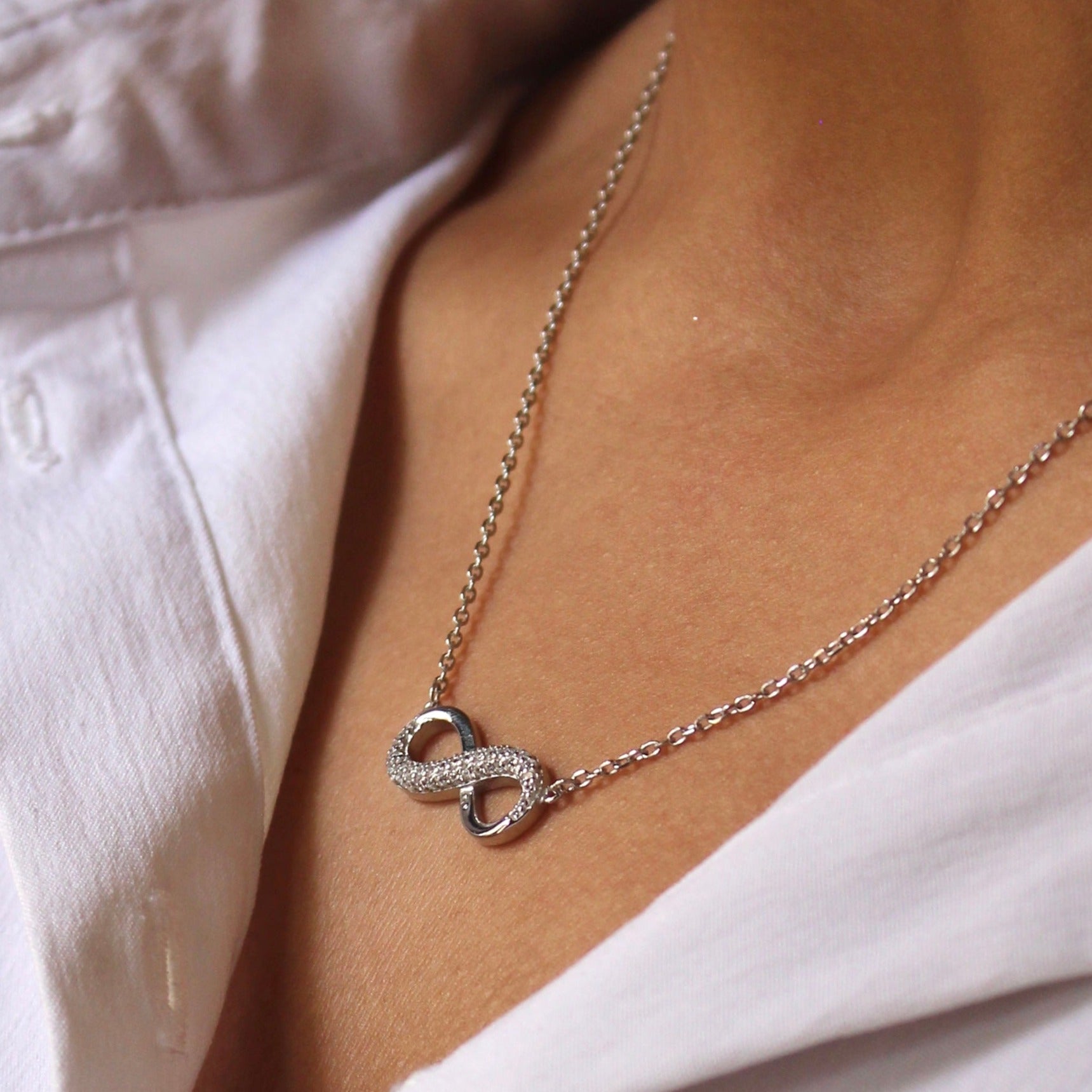 Infinity silver pendant with linked chain