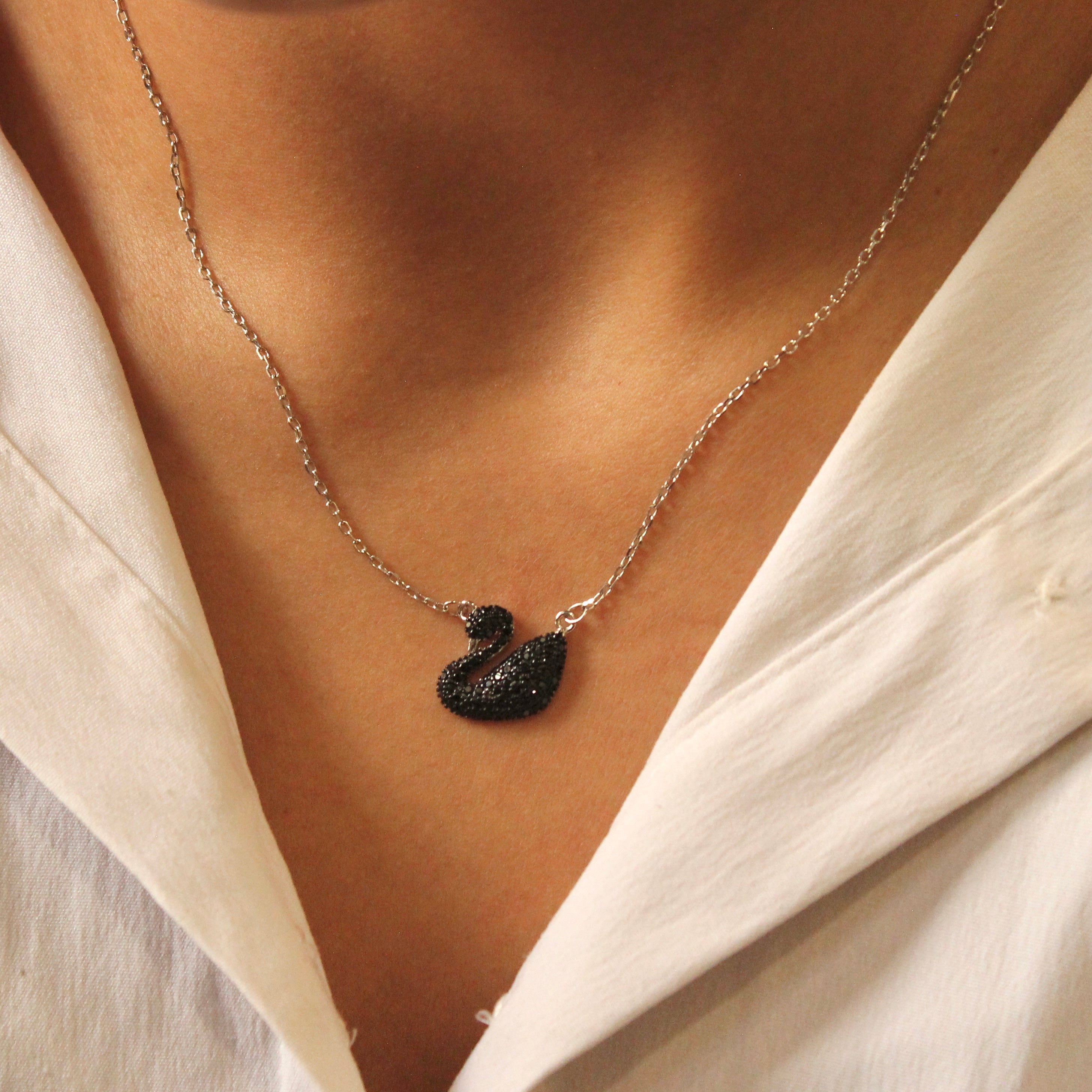 Black swan pendant with 925 silver minimal chain