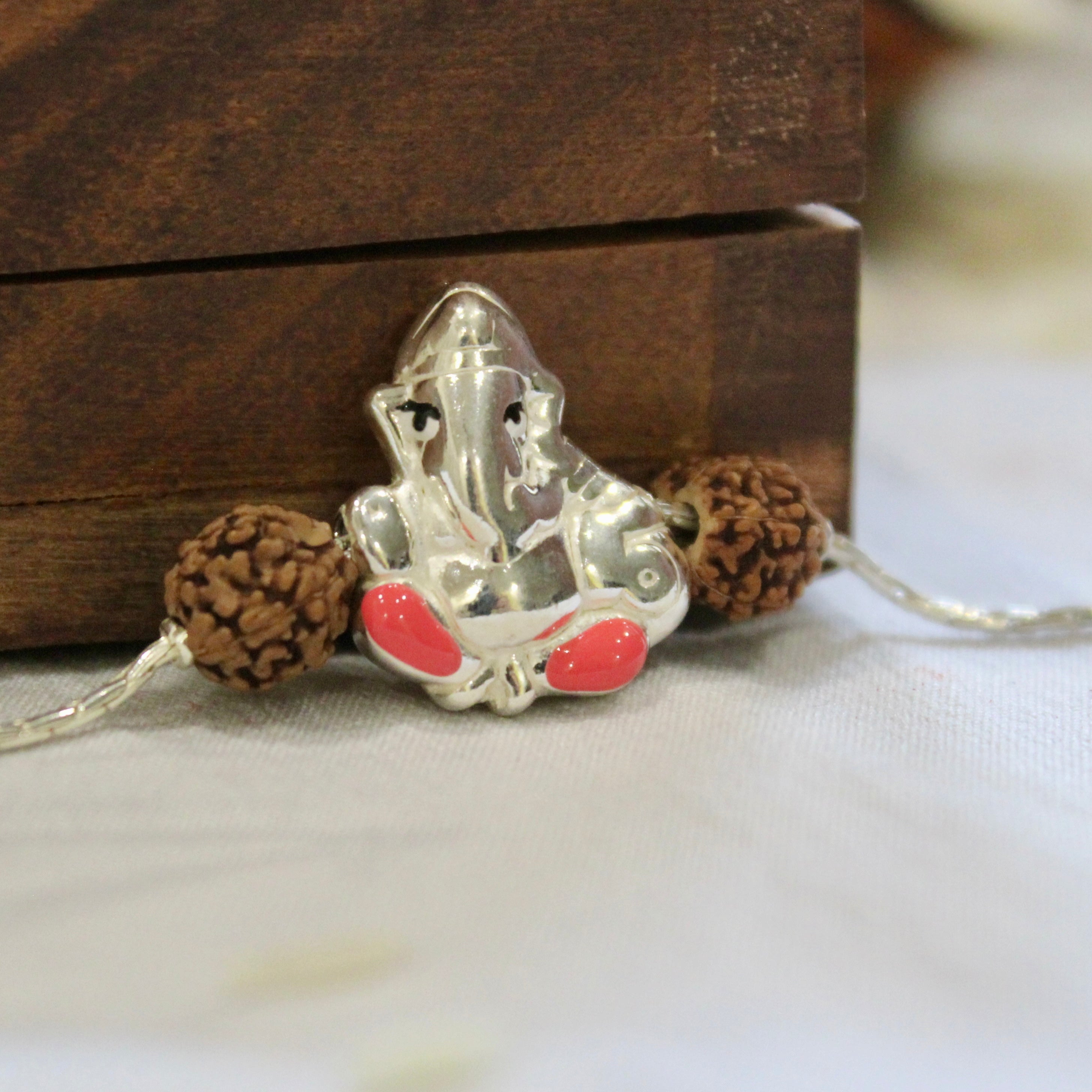 Lord Ganesh Silver Rudraksh Chain Rakhi