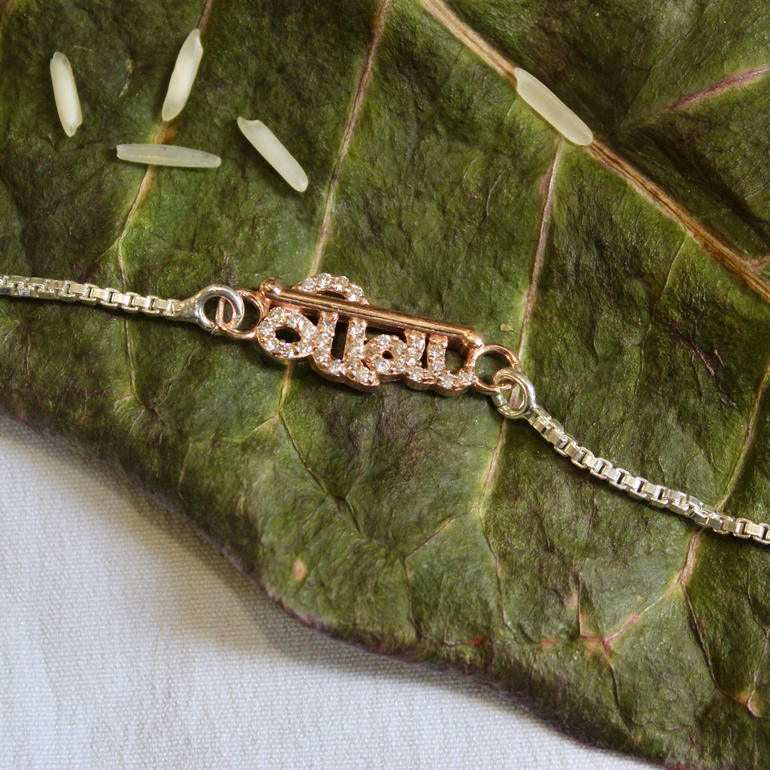 VEERA Silver Chained Rakhi in Rose Gold