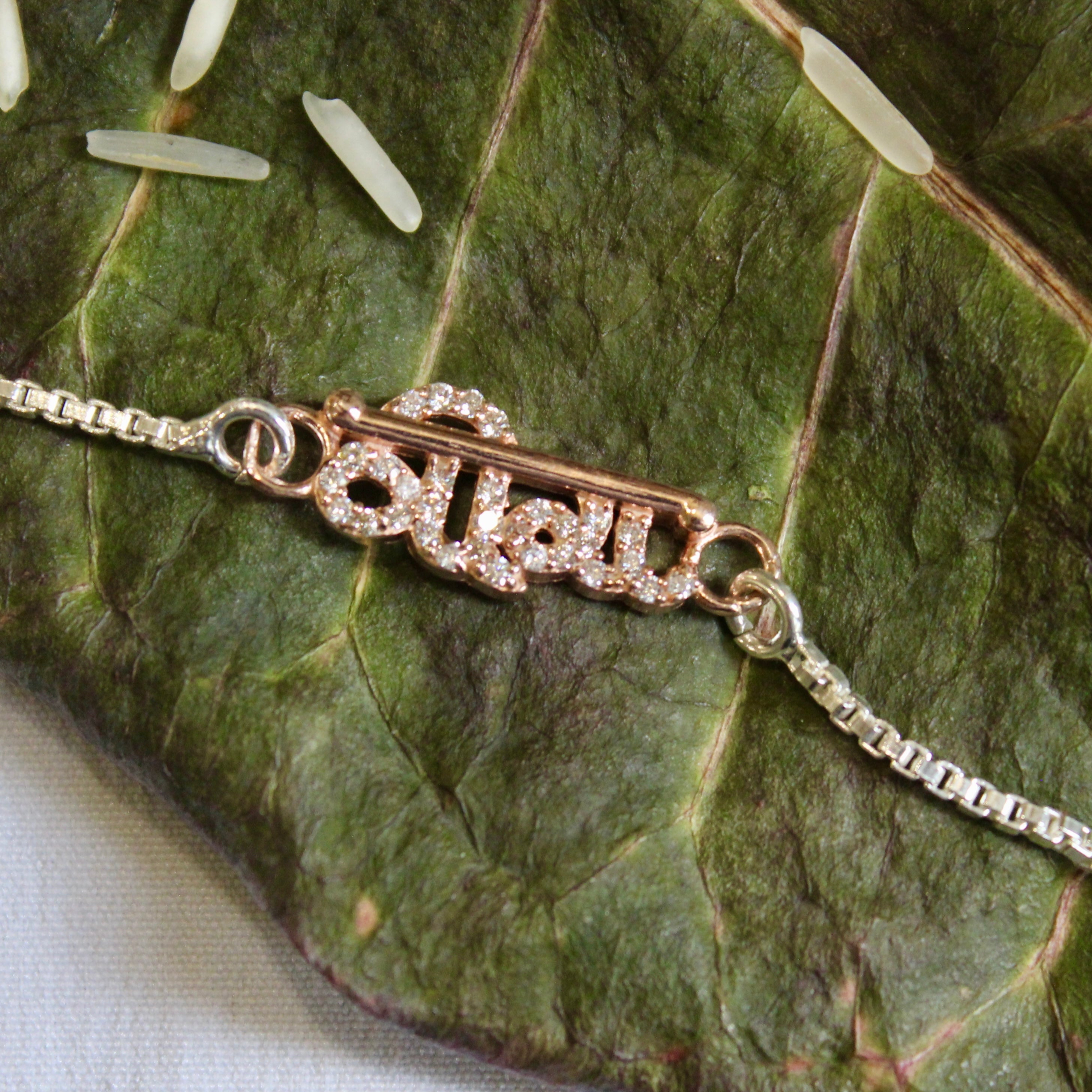 VEERA Silver Chained Rakhi in Rose Gold