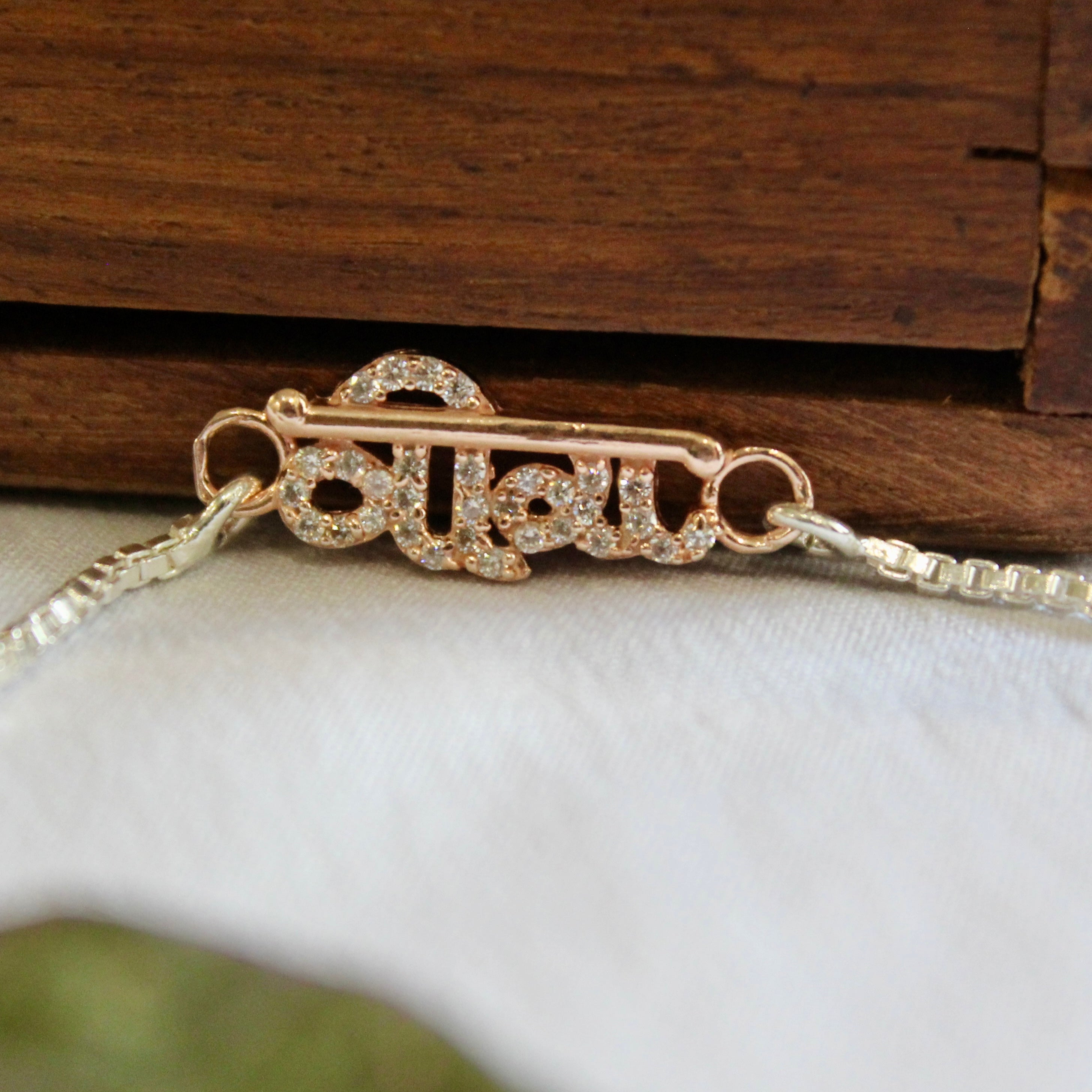 VEERA Silver Chained Rakhi in Rose Gold