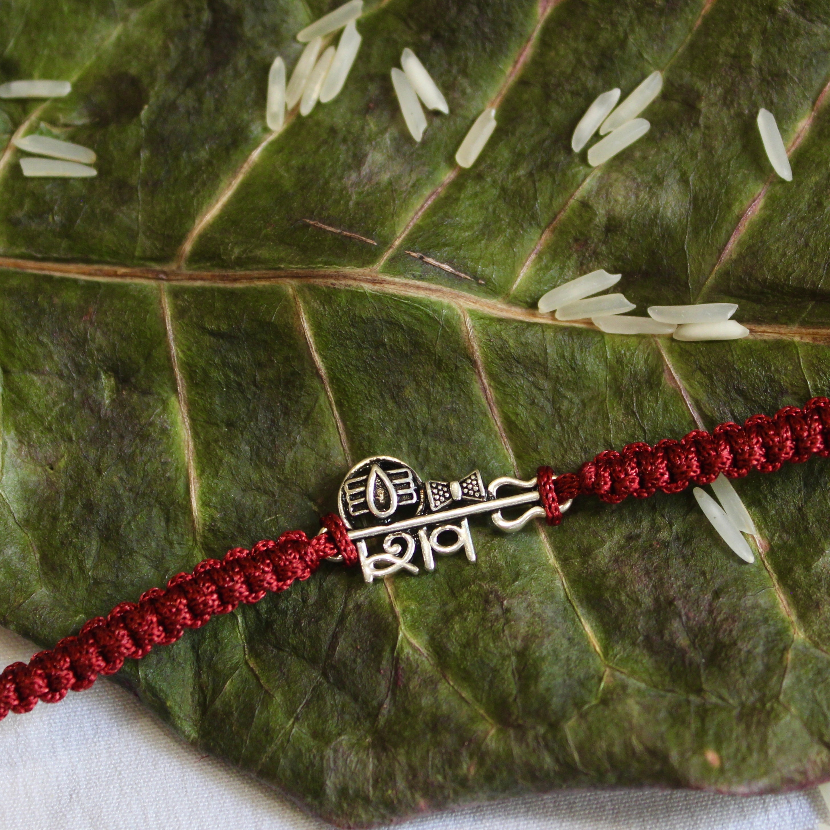 SHiv Maroon Thread Pure Silver Rakhi