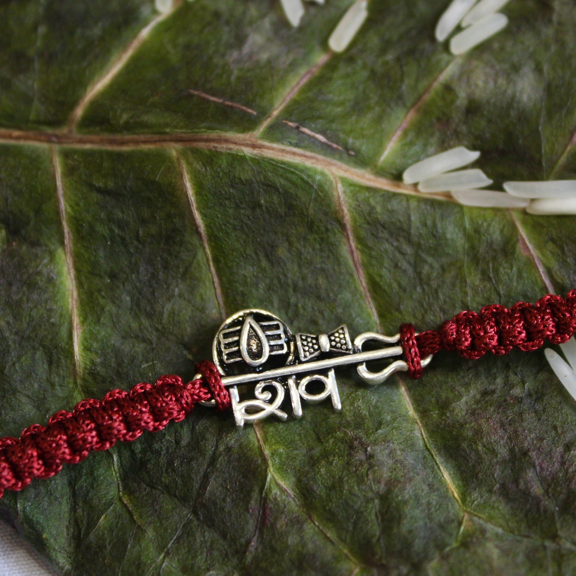 SHiv Maroon Thread Pure Silver Rakhi