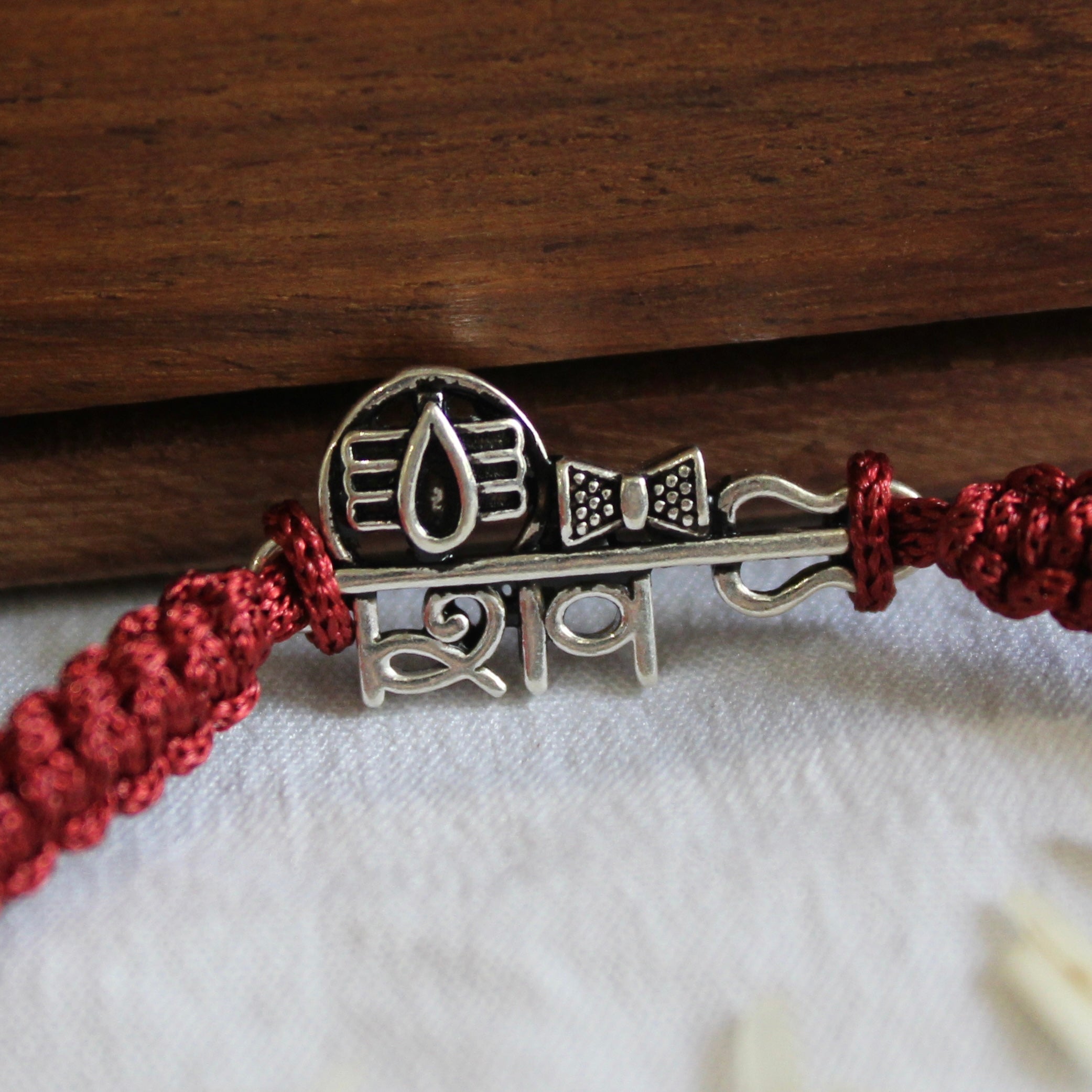 SHiv Maroon Thread Pure Silver Rakhi