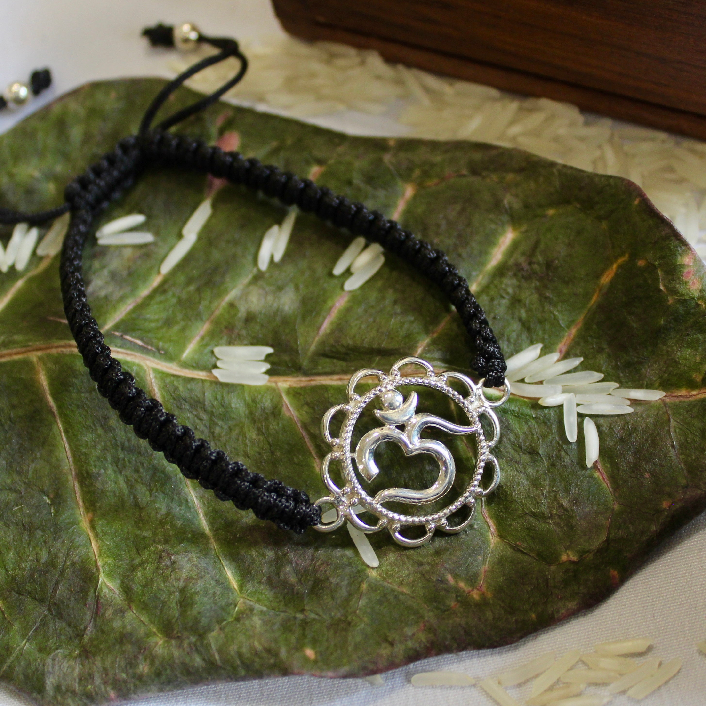 OM Black Thread Pure Silver Rakhi