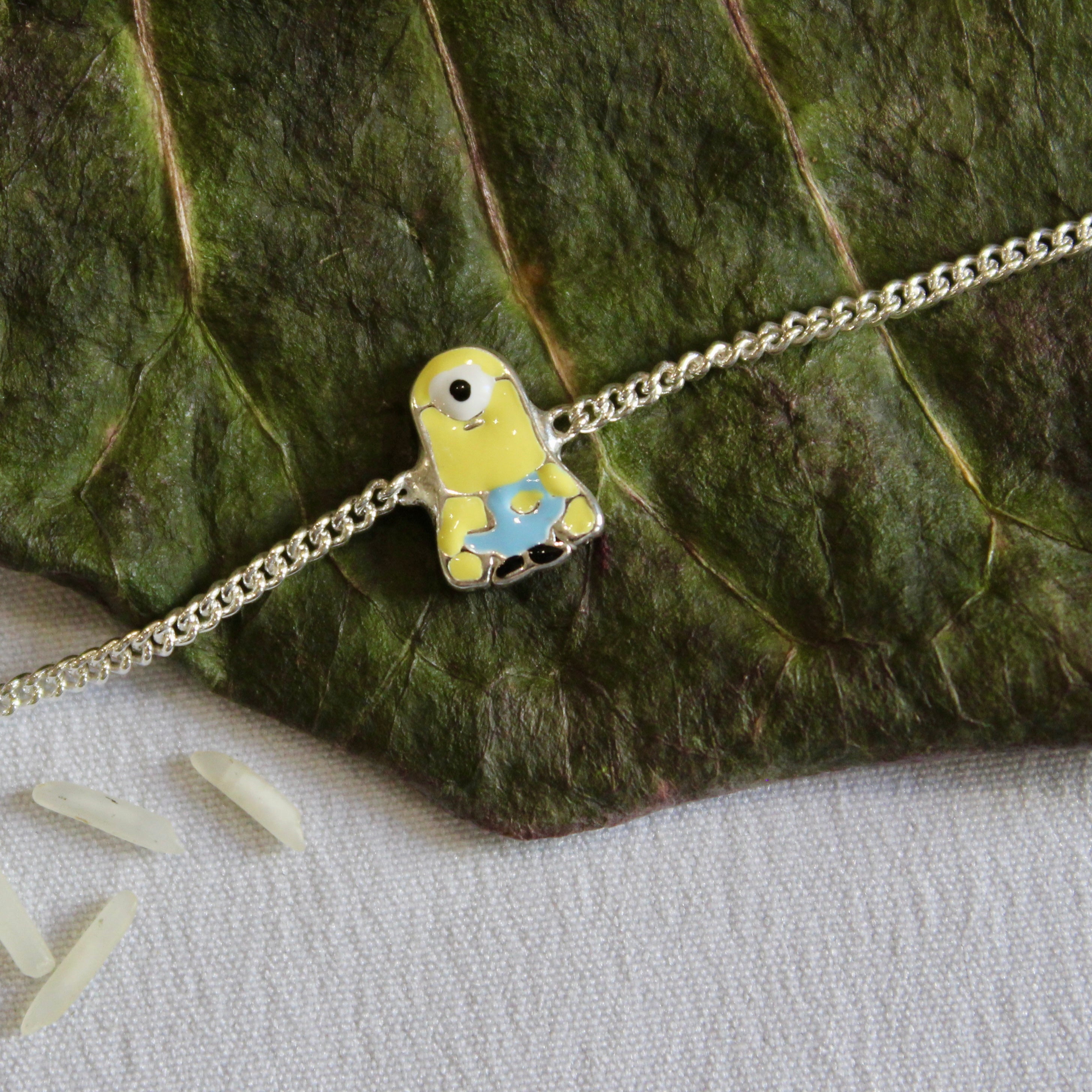 Minion pure silver chained rakhi