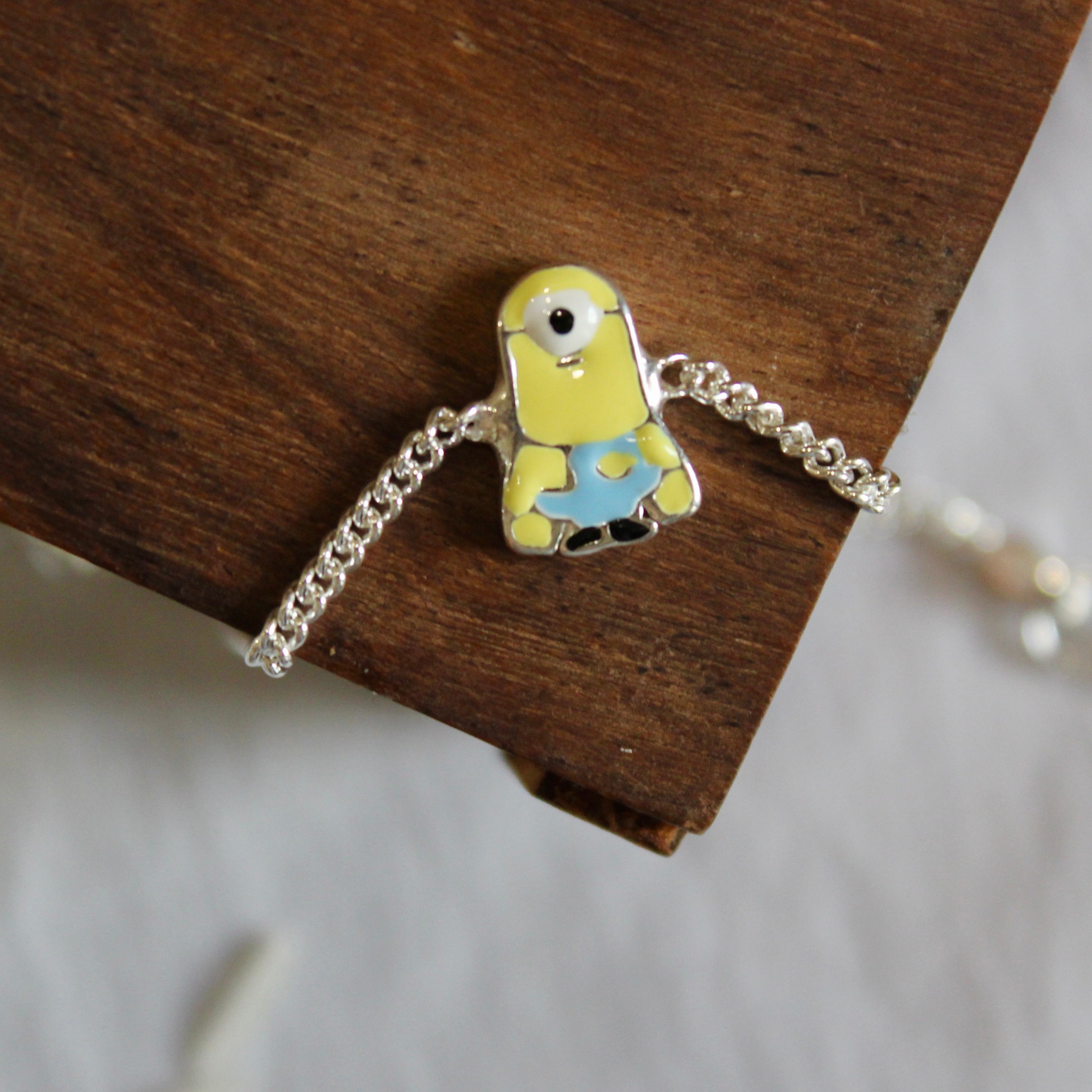 Minion pure silver chained rakhi