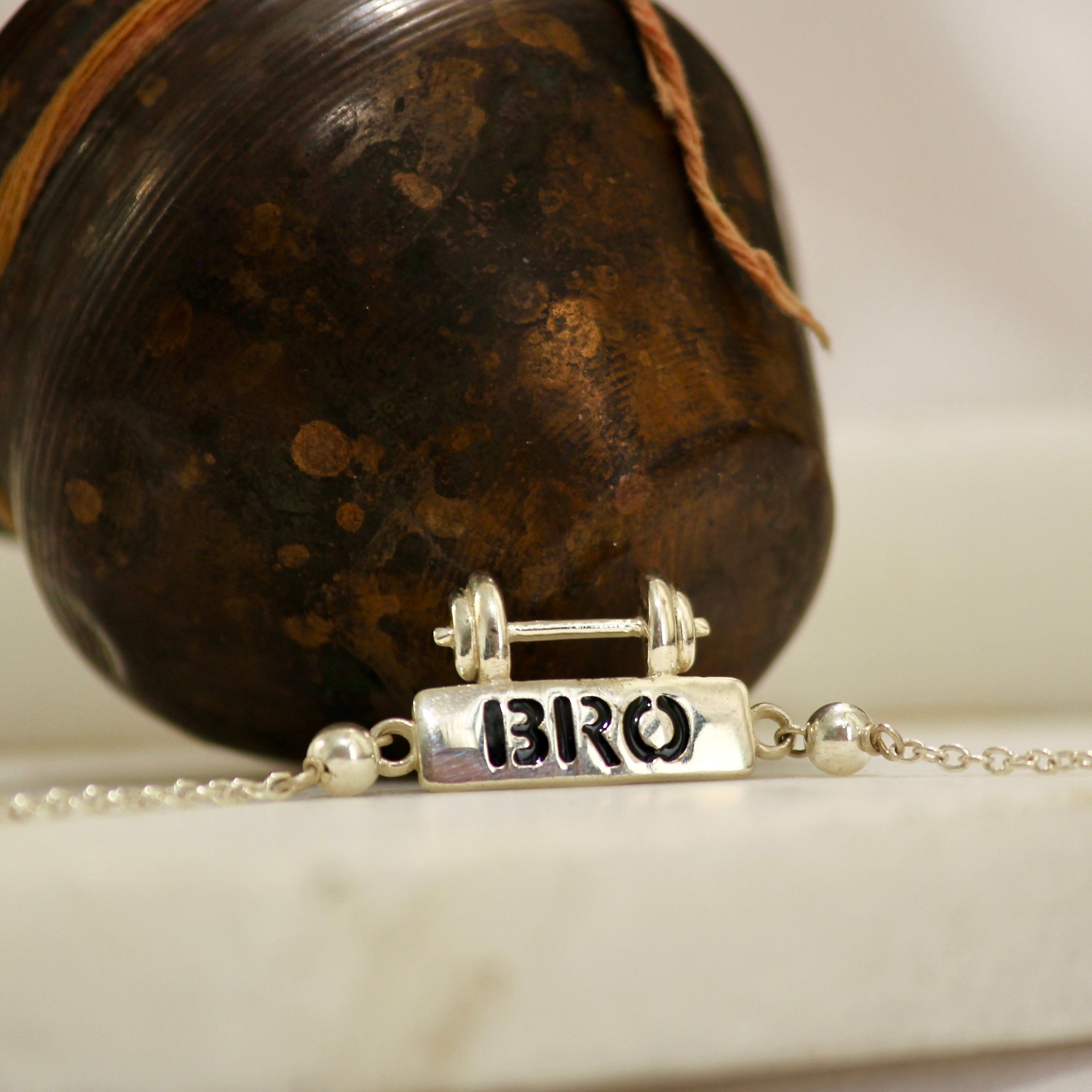 BRO WITH DUMBELL chained rakhi in 925 silver