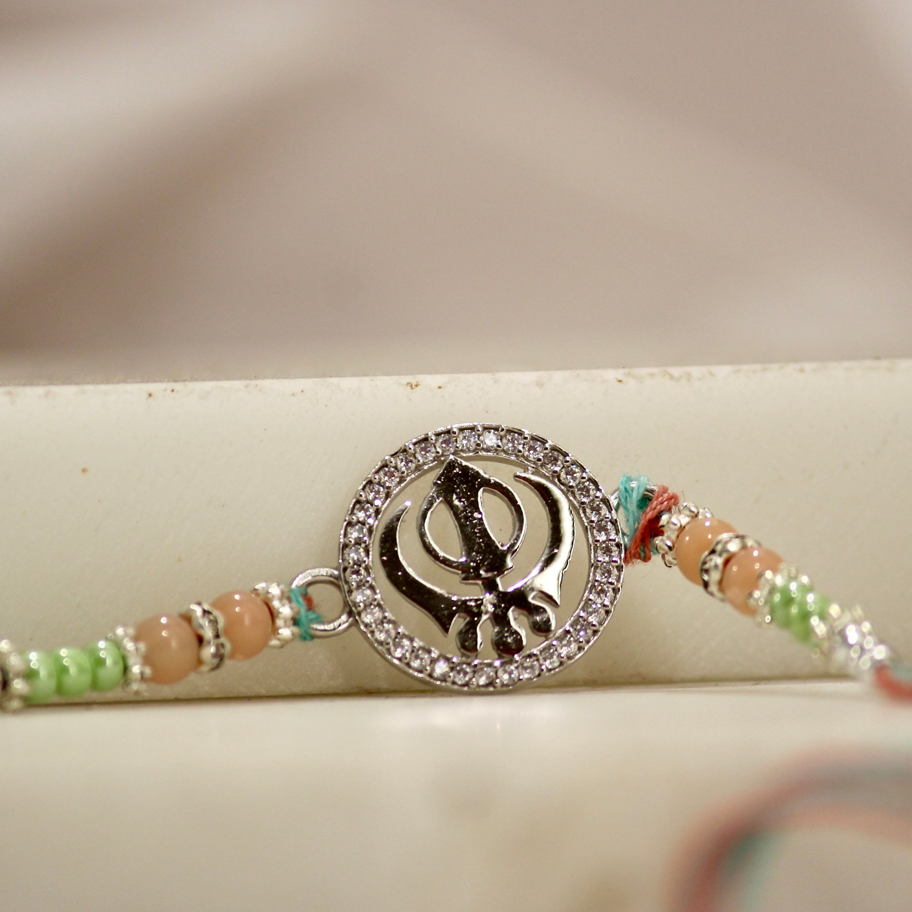 KHANDA 925 silver peach thread rakhi