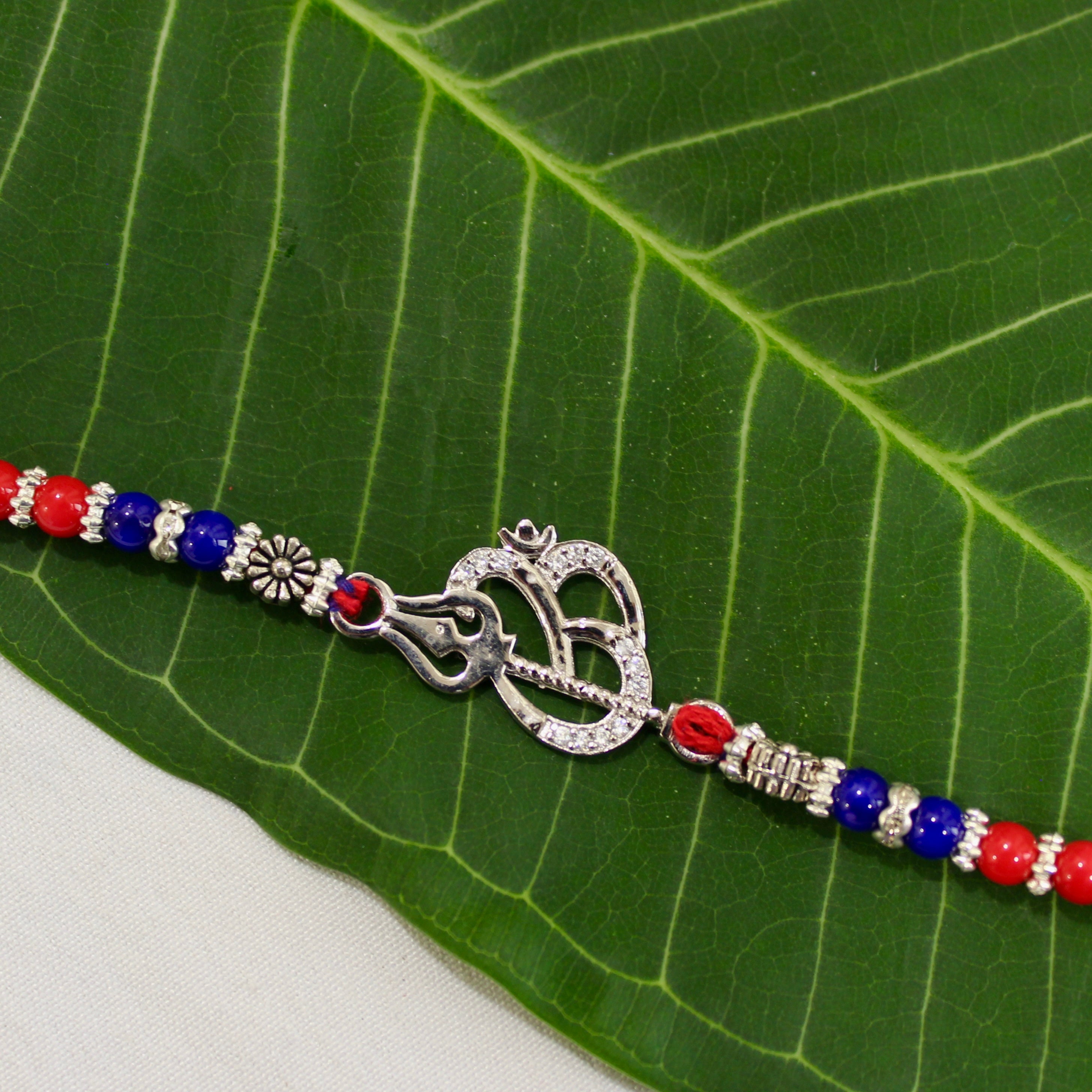 OM WITH TRISHUL 925 silver red thread rakhi