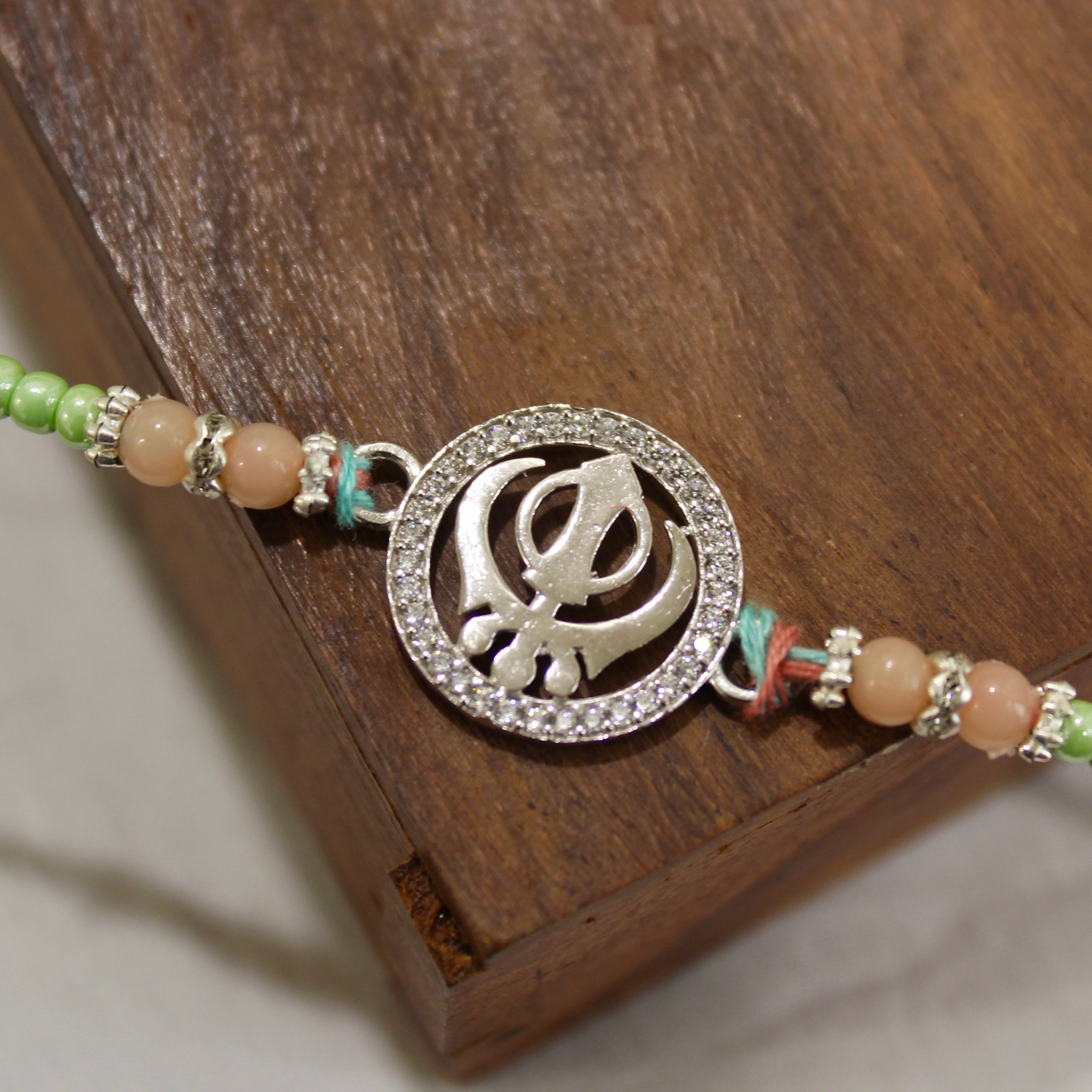 KHANDA 925 silver peach thread rakhi