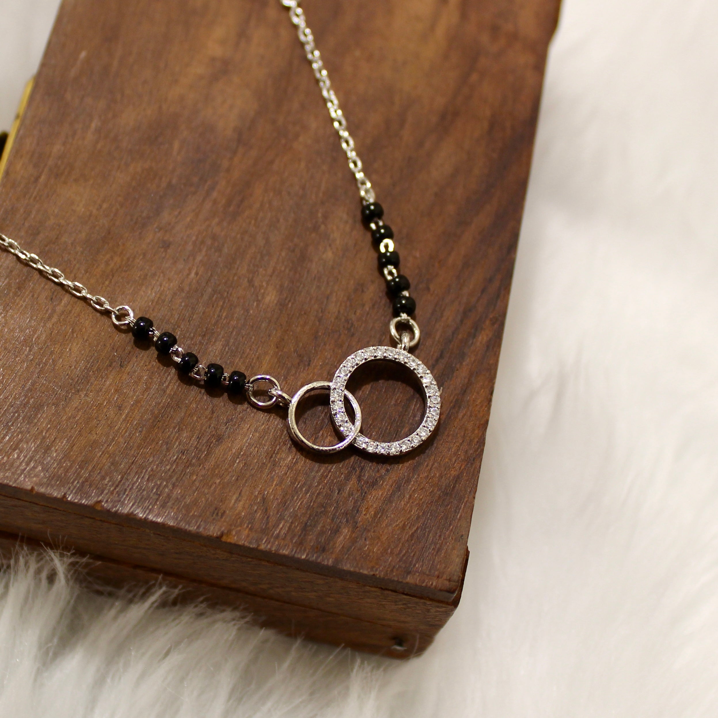 Interconnecting Zircon Stones Mangalsutra in 925 Silver