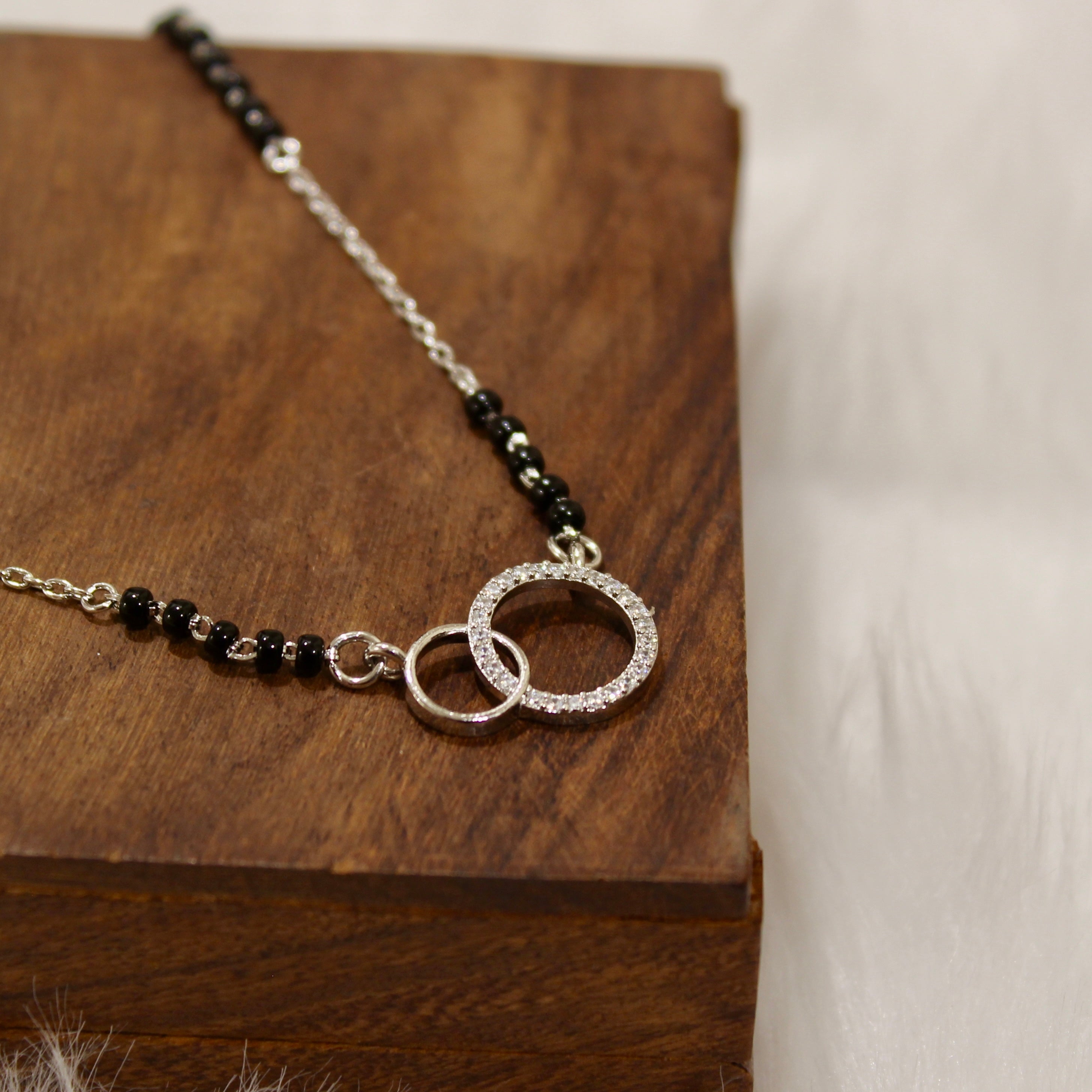 Interconnecting Zircon Stones Mangalsutra in 925 Silver