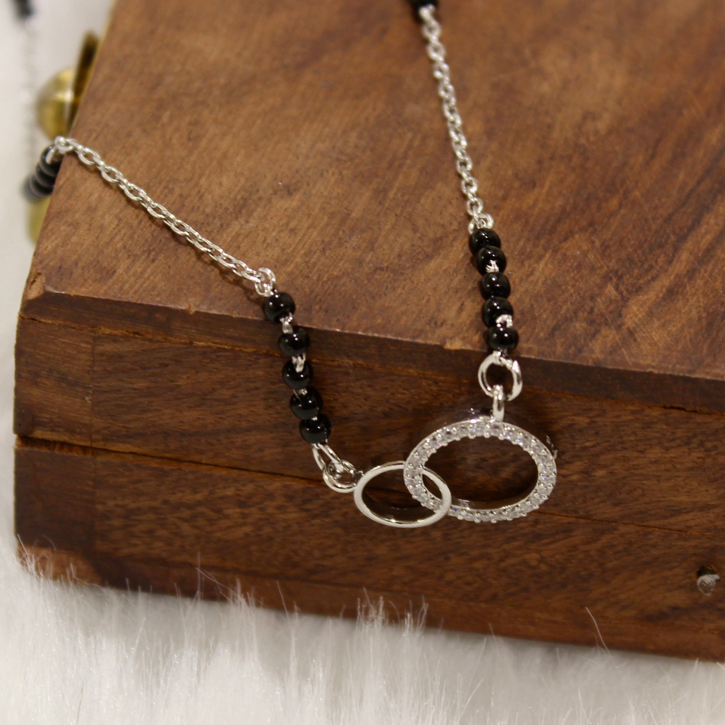 Interconnecting Zircon Stones Mangalsutra in 925 Silver