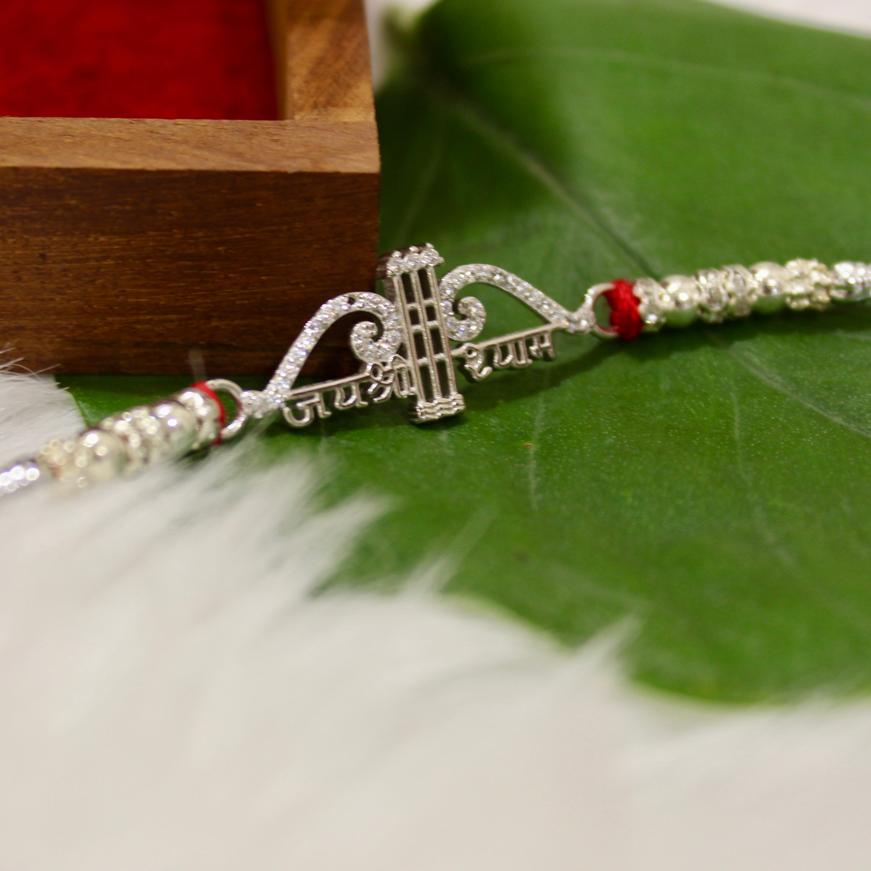 Jaishree Ram Charm Red Thread Rakhi in 925 Silver