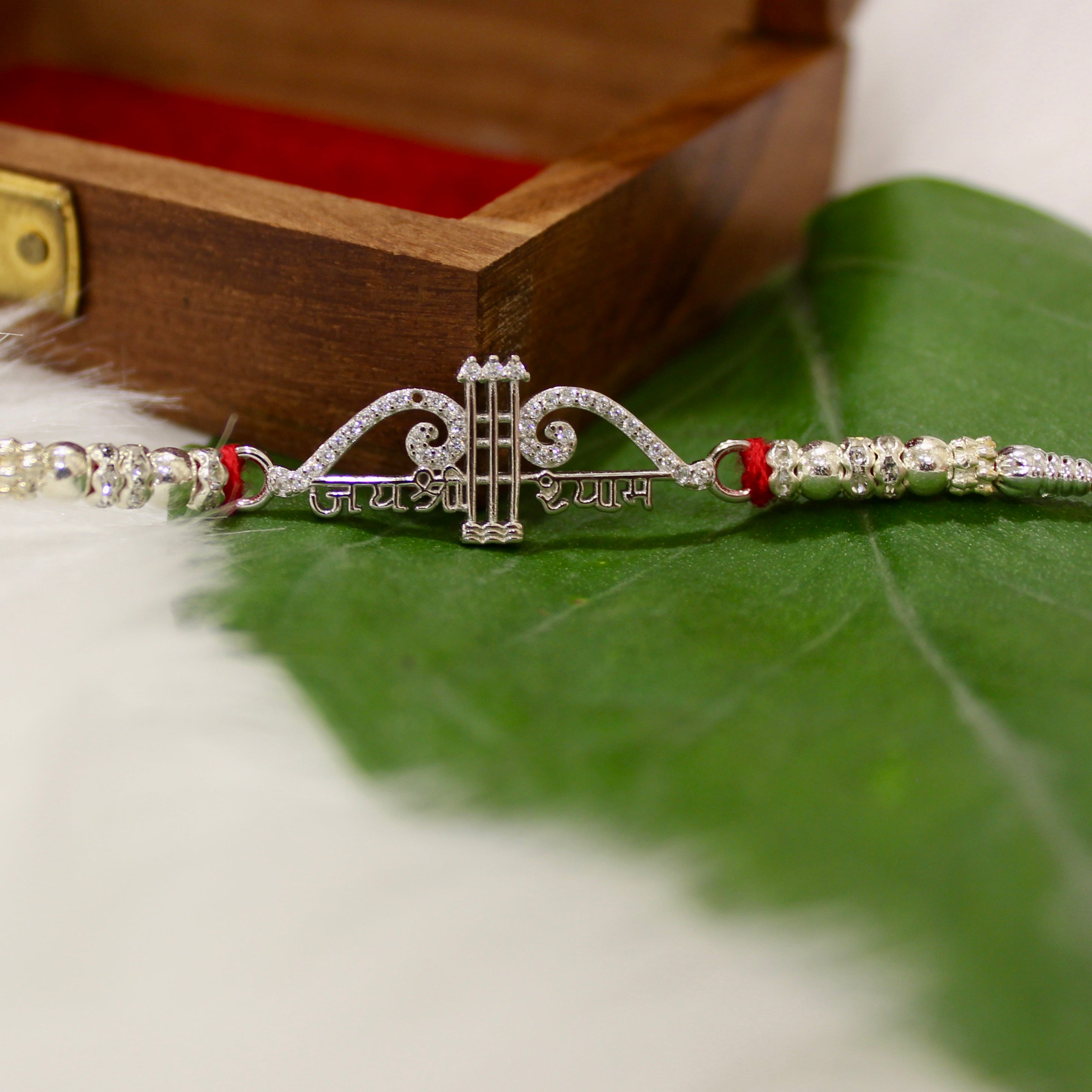 Jaishree Ram Charm Red Thread Rakhi in 925 Silver