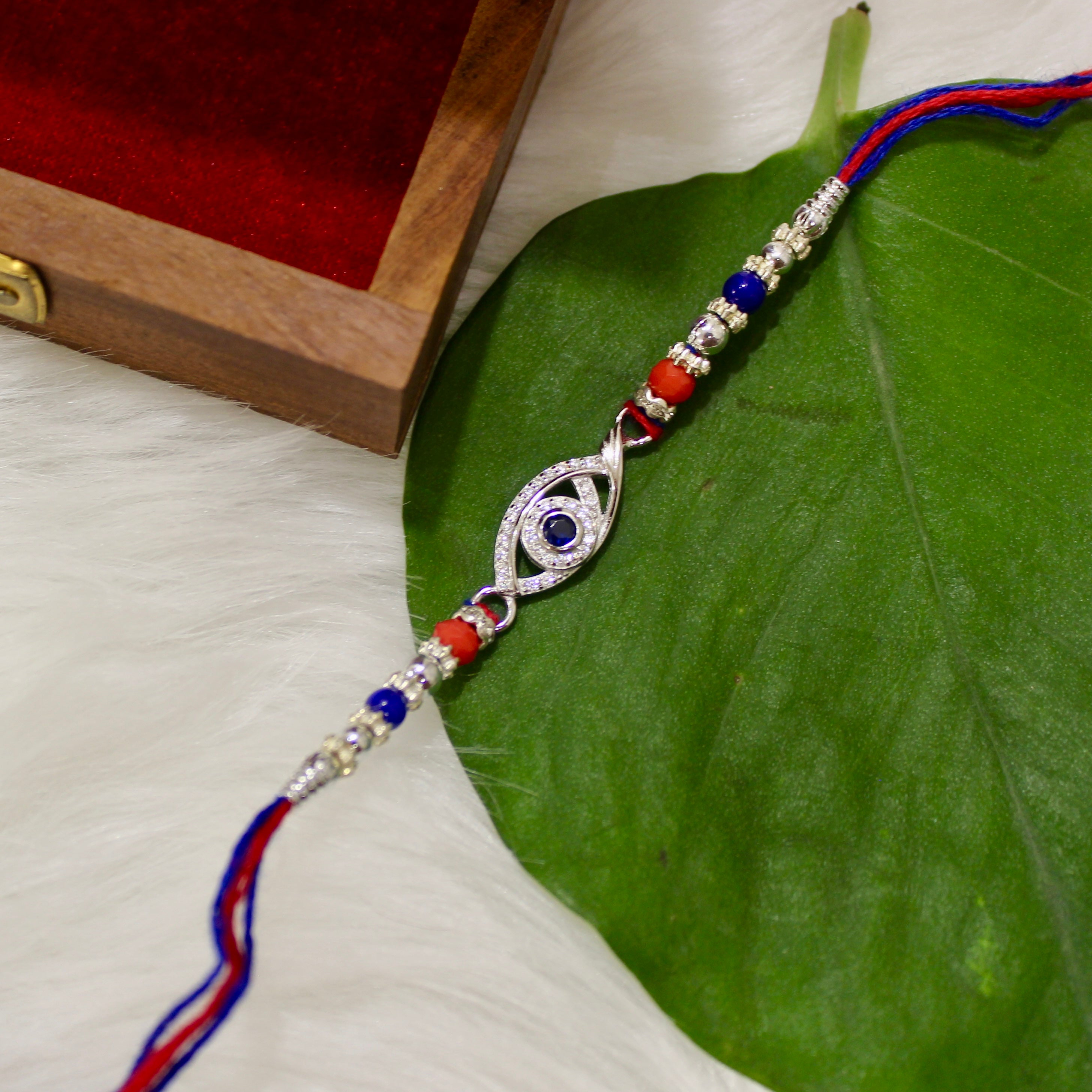 Evil Eye Charm Blue Thread Rakhi In 925 Silver