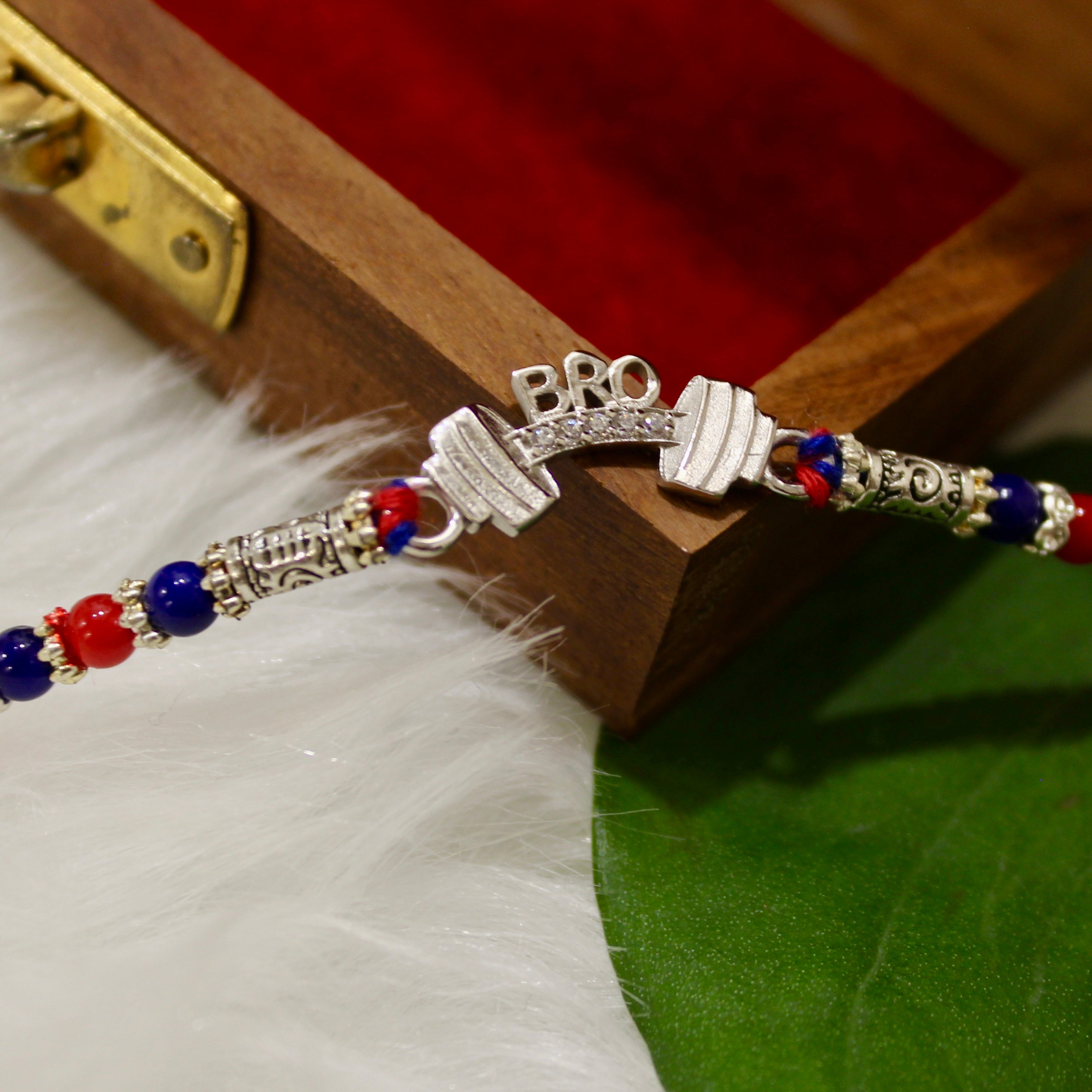 Bro With Dumbell Silver Red Blue Thread Rakhi In 925 Silver