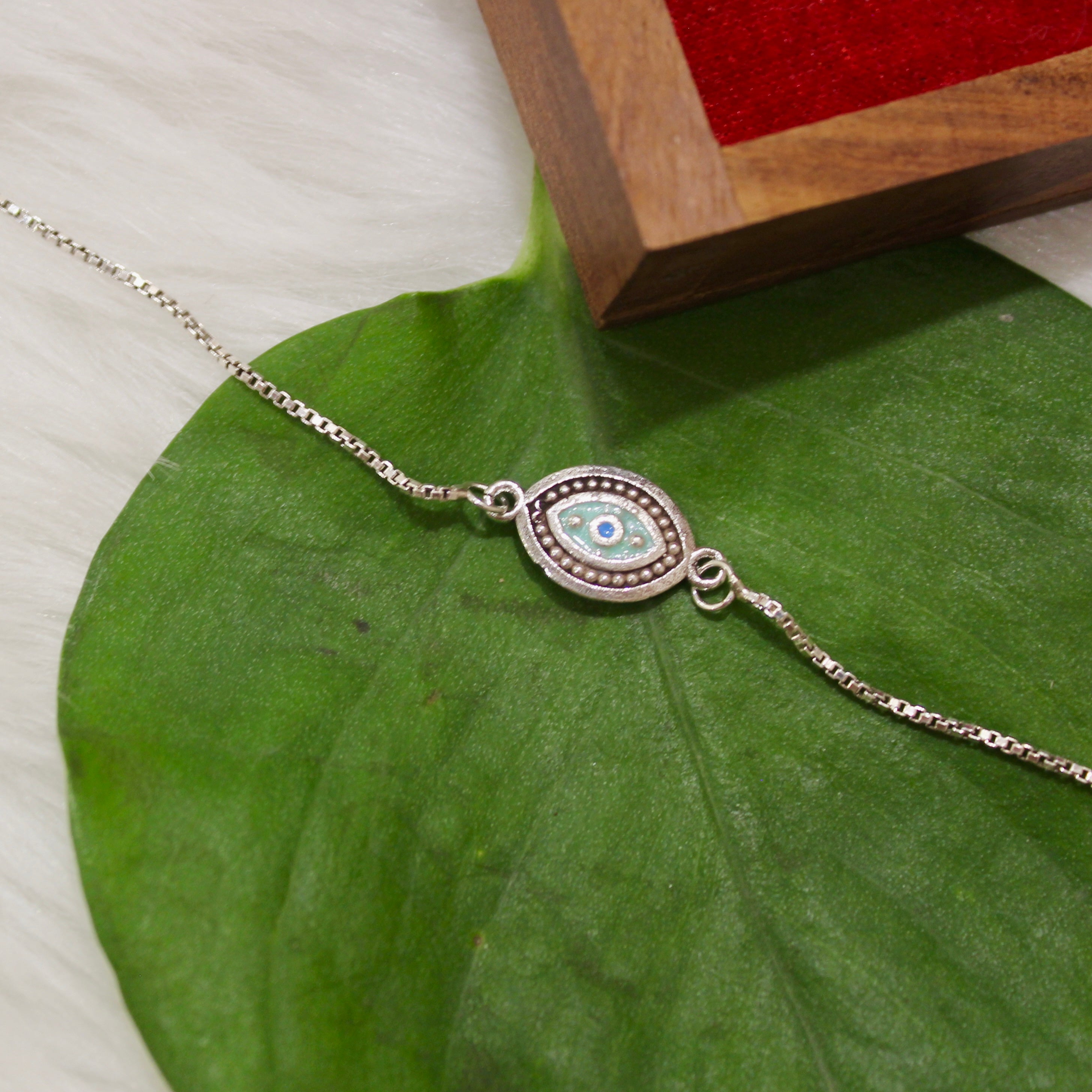 Aqua Evil Eye Chained Rakhi In 925 Silver